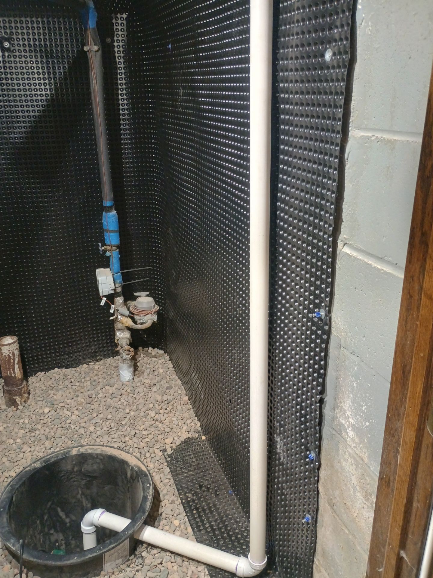 Interior Drain Tile & Sump Pump System in West Minneapolis by Waterproofing Northeast