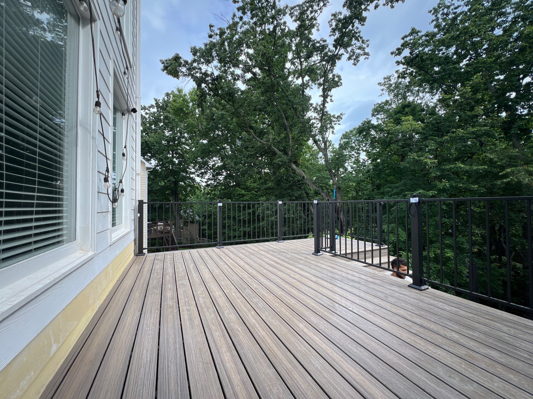 Elevated Composite Deck and Concrete Landing Installation in Kennesaw by Swift Home Renovations