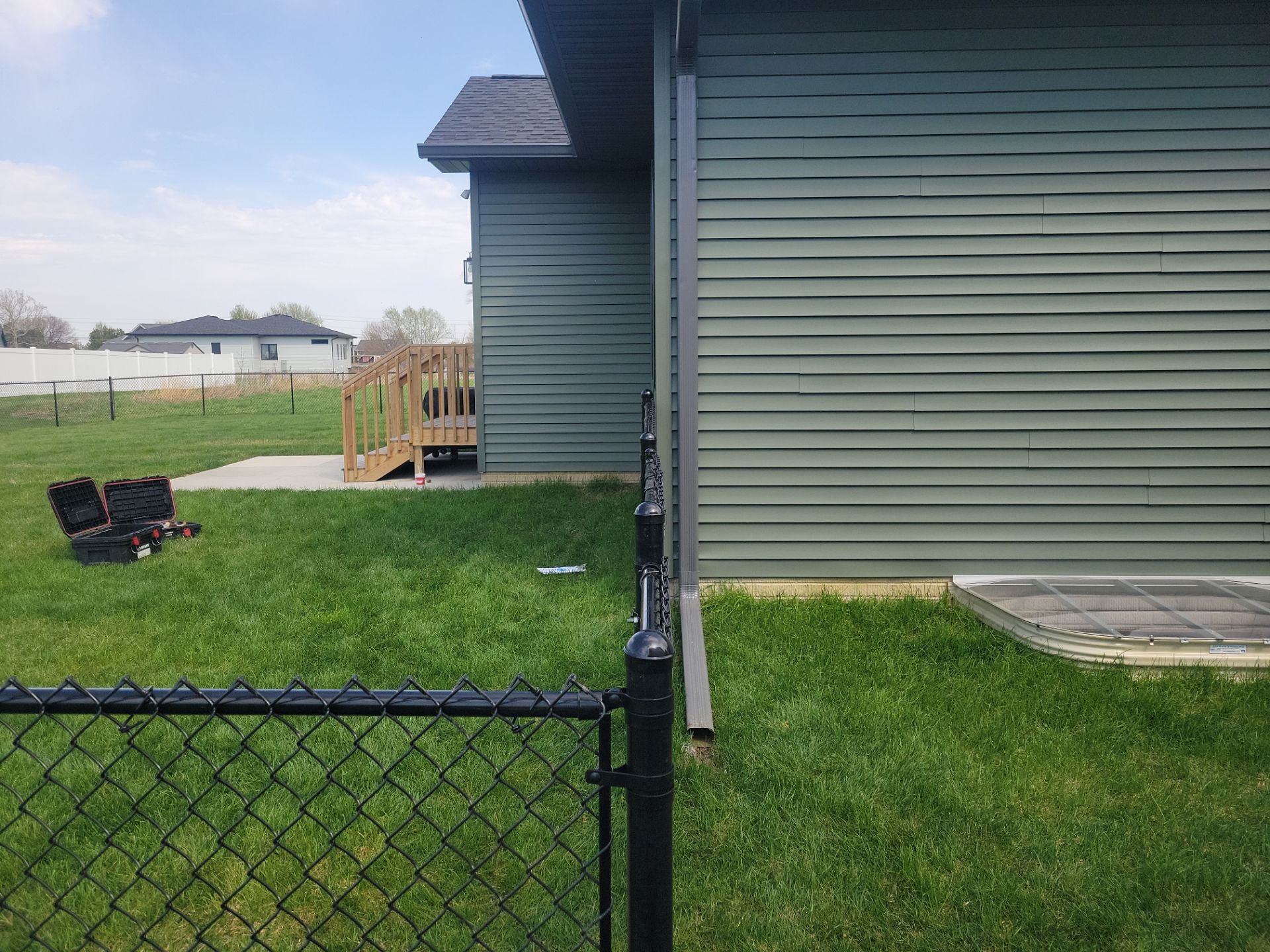 Black Chain Link Fence and Gate Installation in Cedar Falls by Perfect Picket Fence and Stain