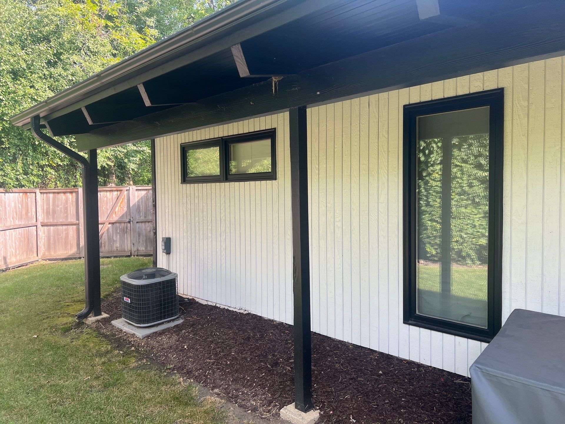 Complete Exterior House, Bluestone & Garage Floor Cleaning by Northern Power Washing LLC.