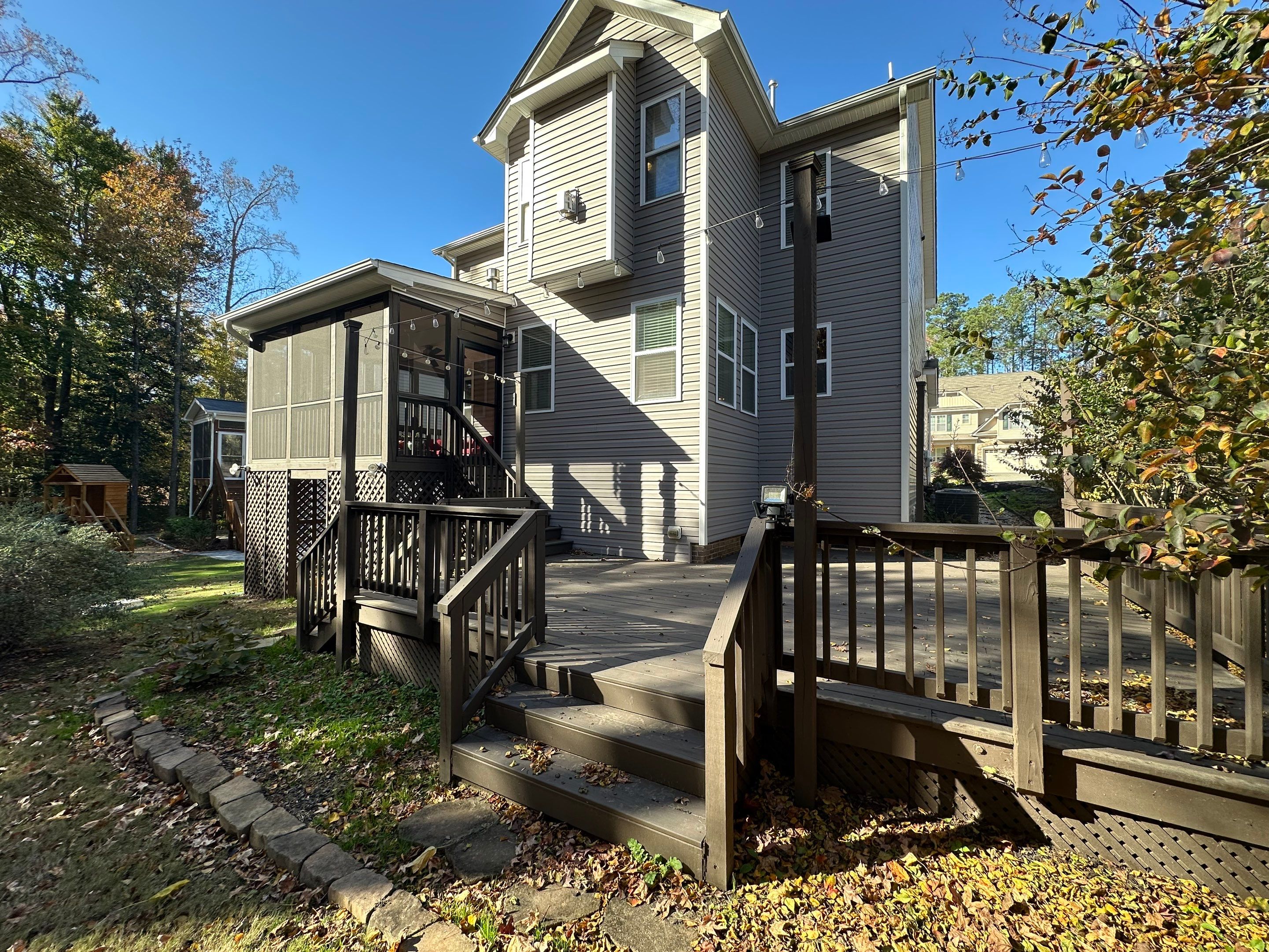 Elevated Screened Porch Addition and Deck Integration in Knightdale by The Remodeling Company