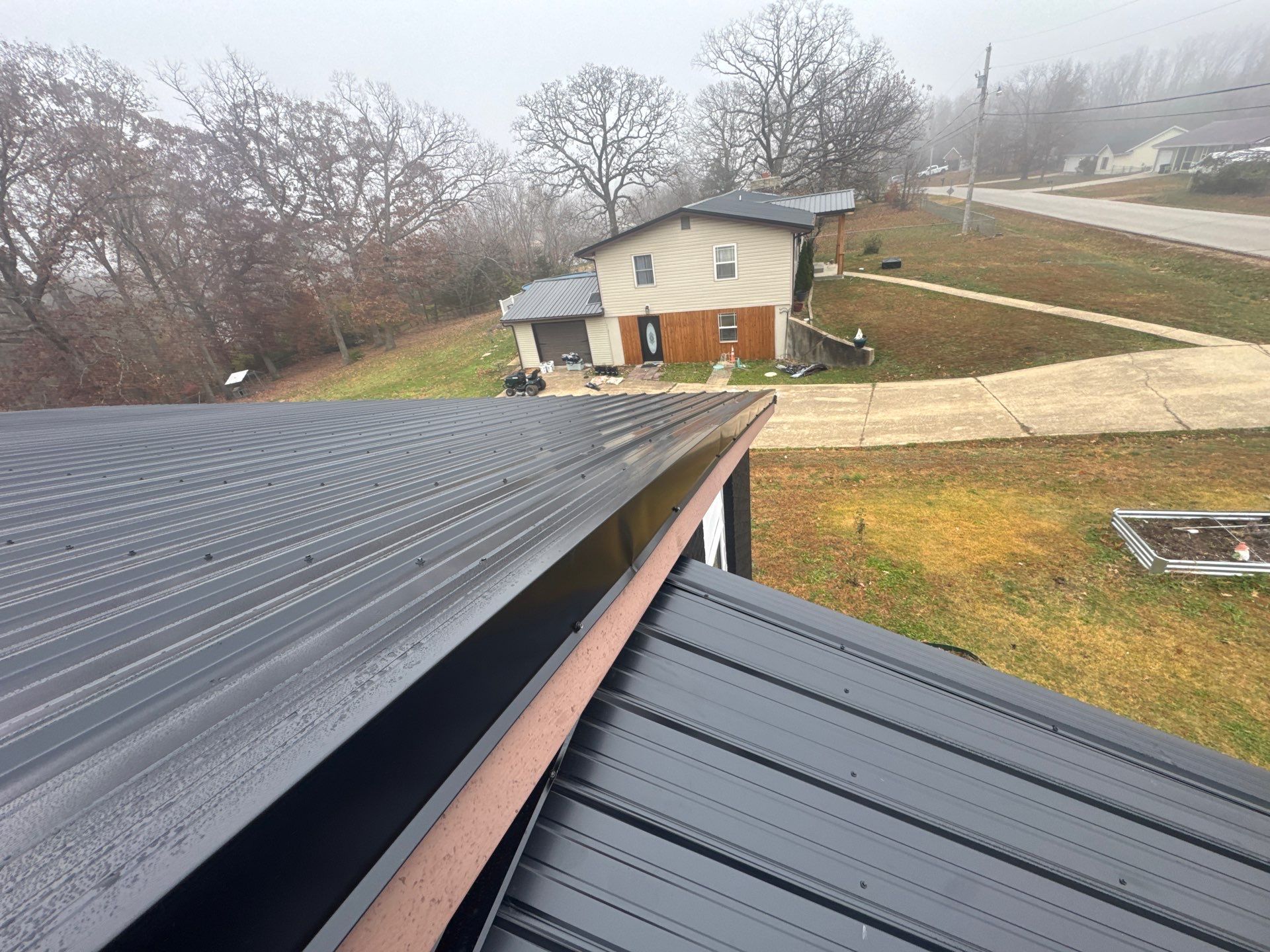 Residential Metal Roof Install - 26 Gauge G-Rib Metal - Color Shiny Black  by Titan Commercial & Residential Roofing 