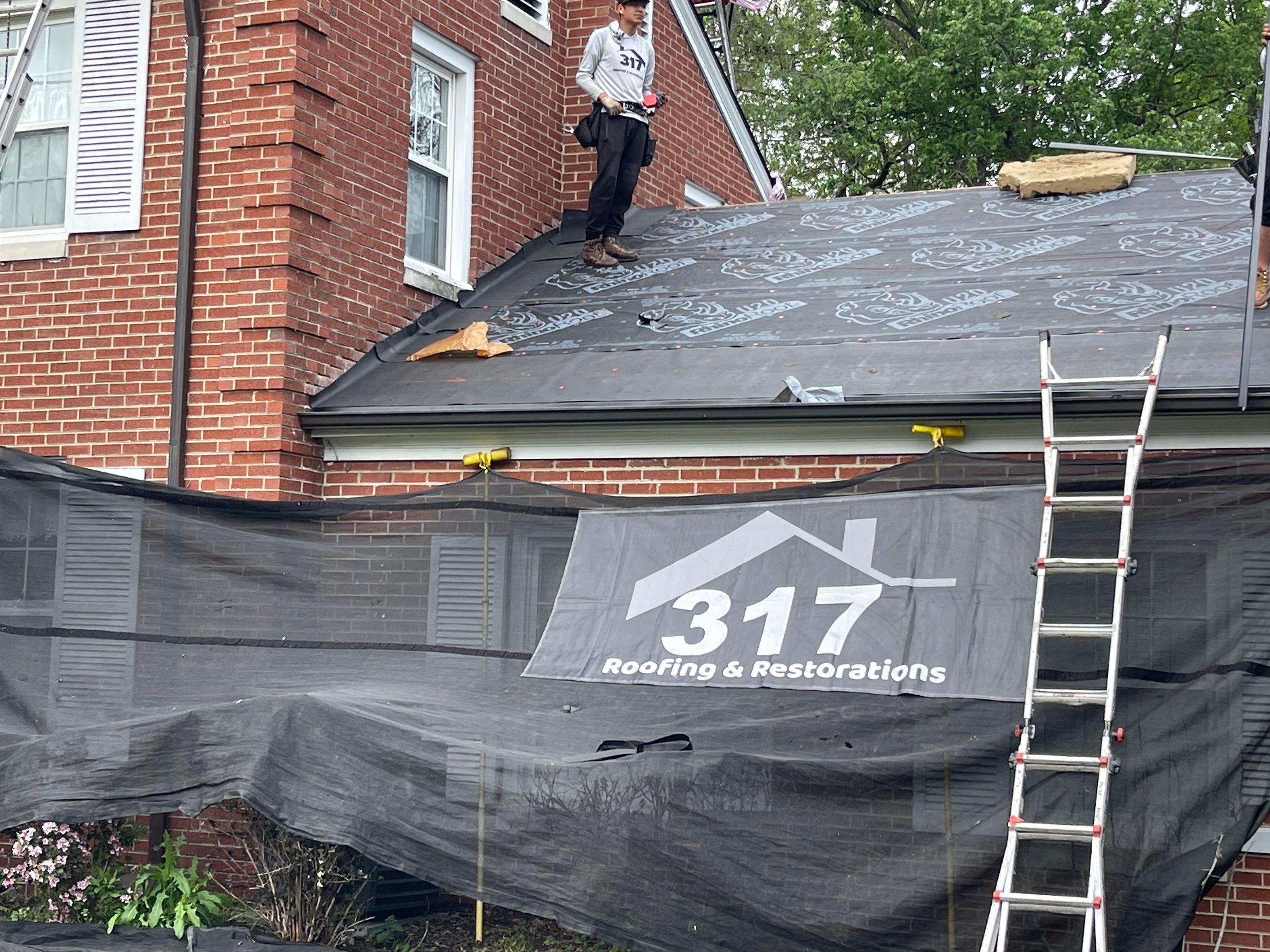 Oakridge Onyx Black and Black Gutters by 317 Roofing & Restorations