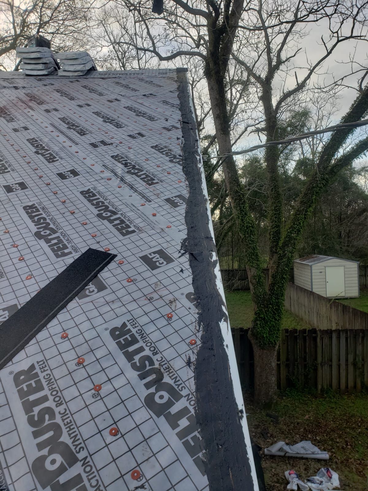Residential Roofing Installation using Roof Replacement by American Roofing & Construction LLC