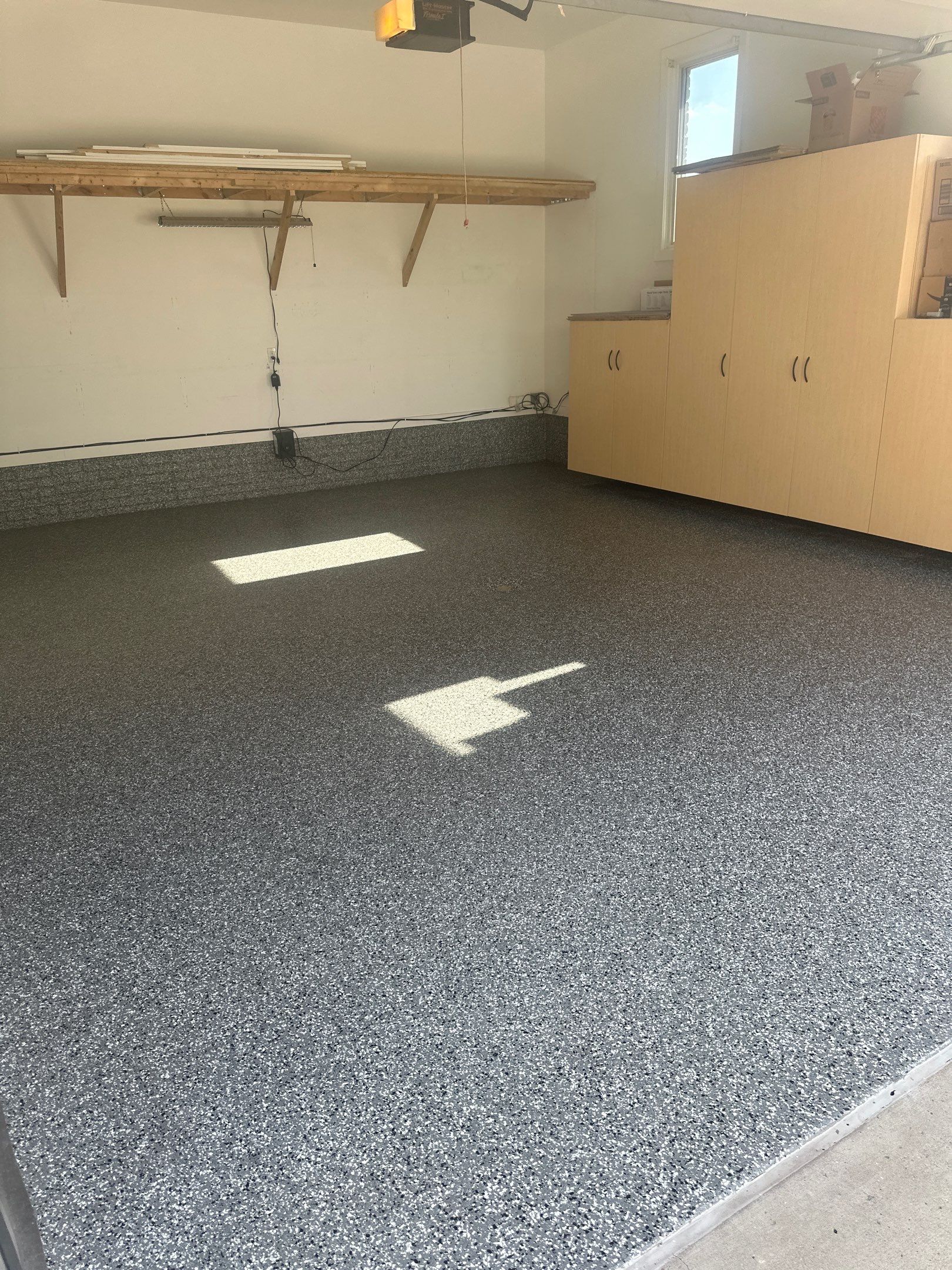 FLEXING 💪 on the Old Epoxy Coating with a Polyaspartic Coating Built to Last 💪  by Revival Concrete Coatings, LLC