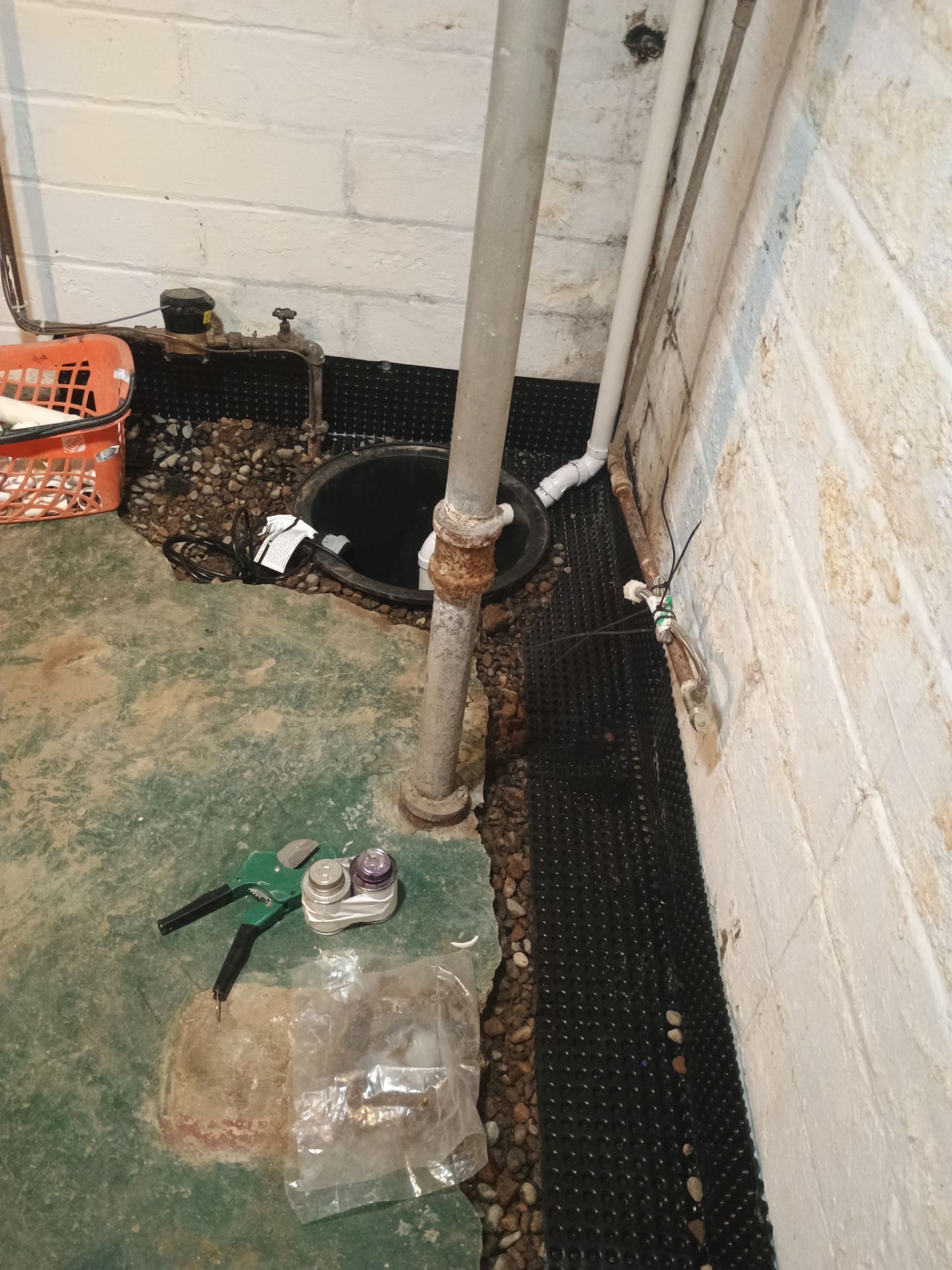 Sump Pump & Buried Discharge in Northeast Minneapolis by Waterproofing Northeast