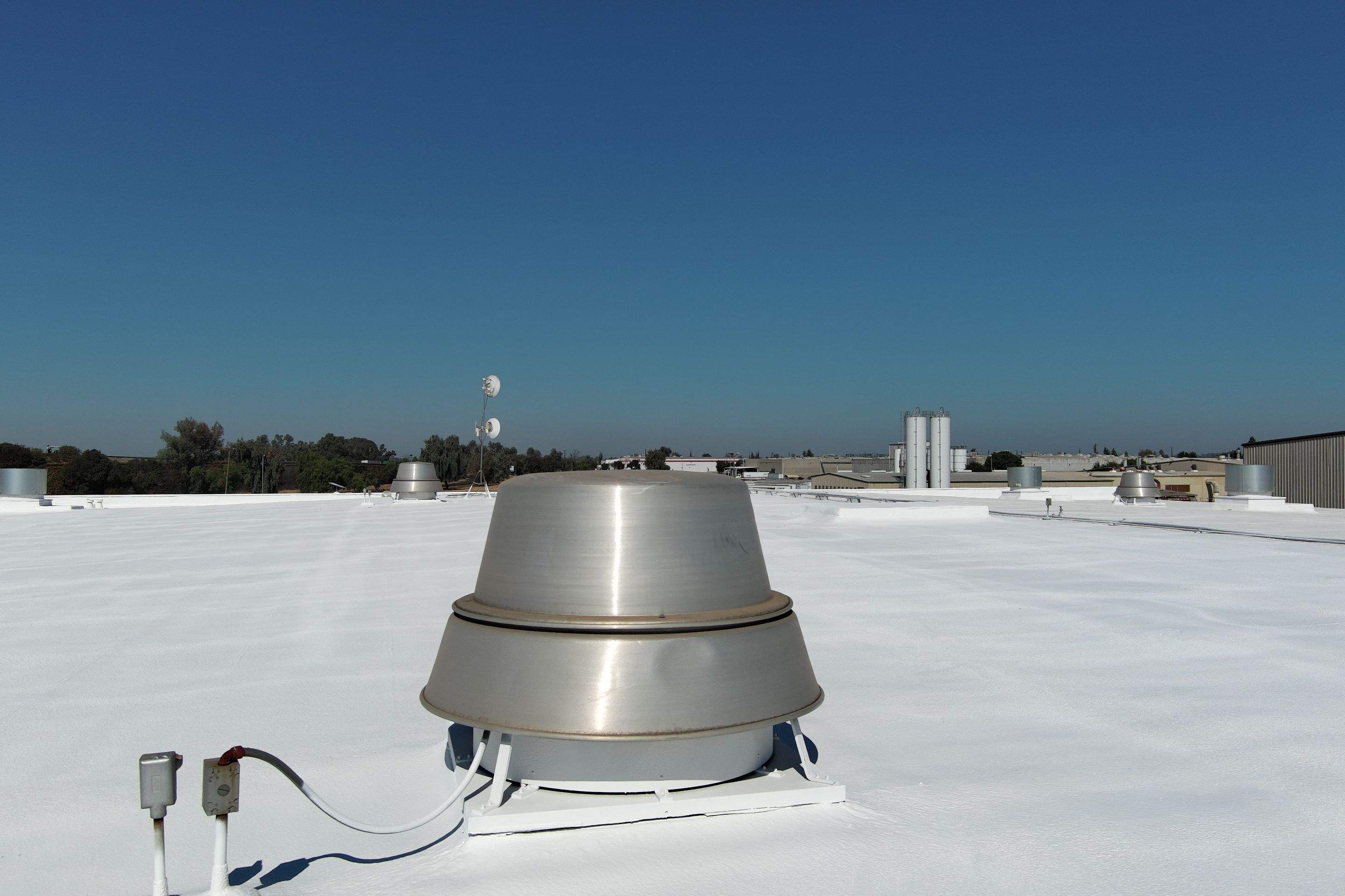 Pro Farms Spray foam roofing project by Straight Edge Roofing Inc