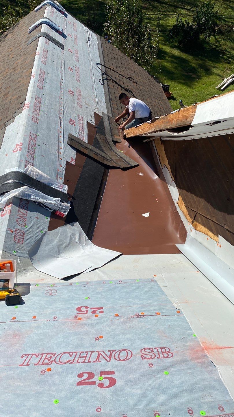Residential Roofing Installation using Roof Replacement by American Roofing & Construction LLC
