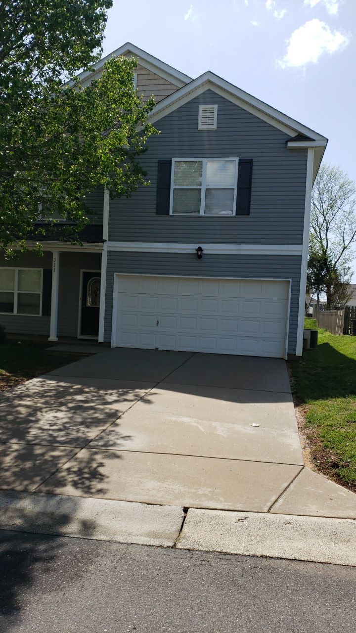 House Wash using cleaner by Power Wash Masters LLC