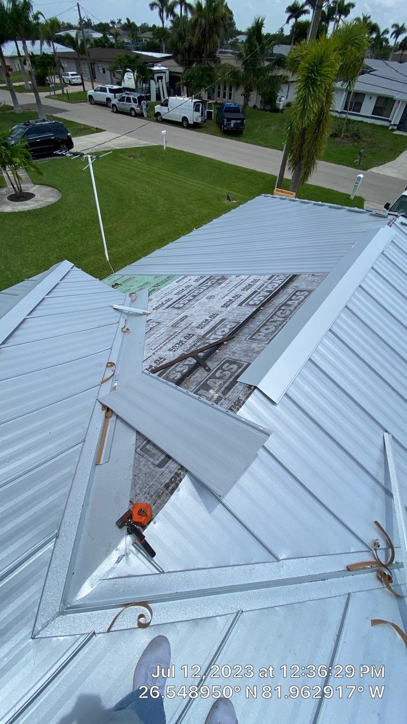 Residential Roofing Installation using Standing Seam Metal by Protek 
