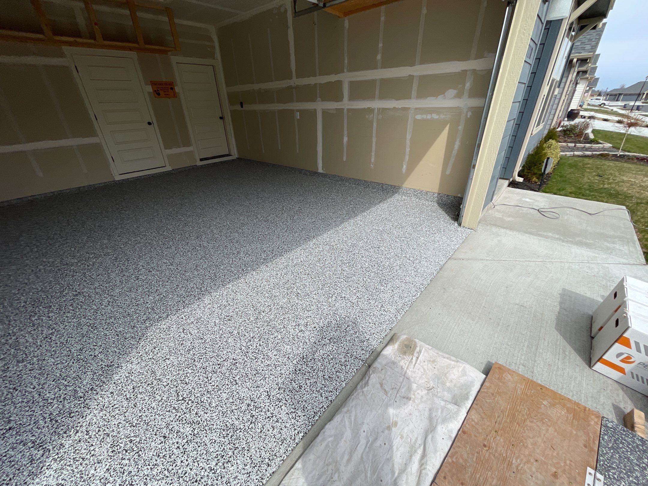Garage Transformation using Domino by Croc Coatings, LLC