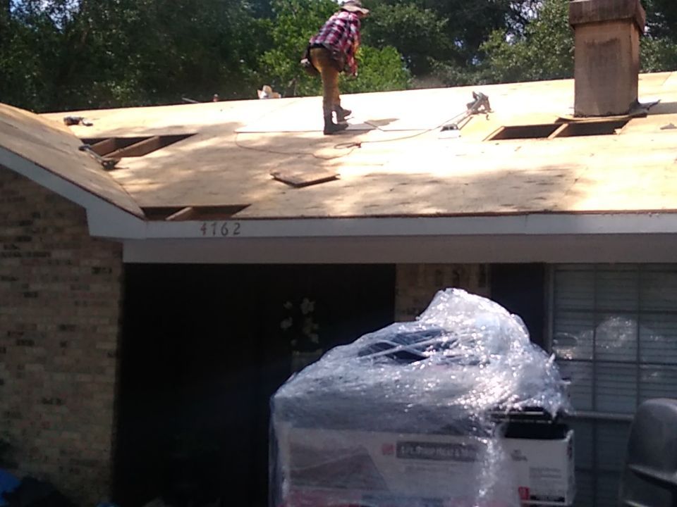 Residential Roofing Installation using Roof Replacement by American Roofing & Construction LLC