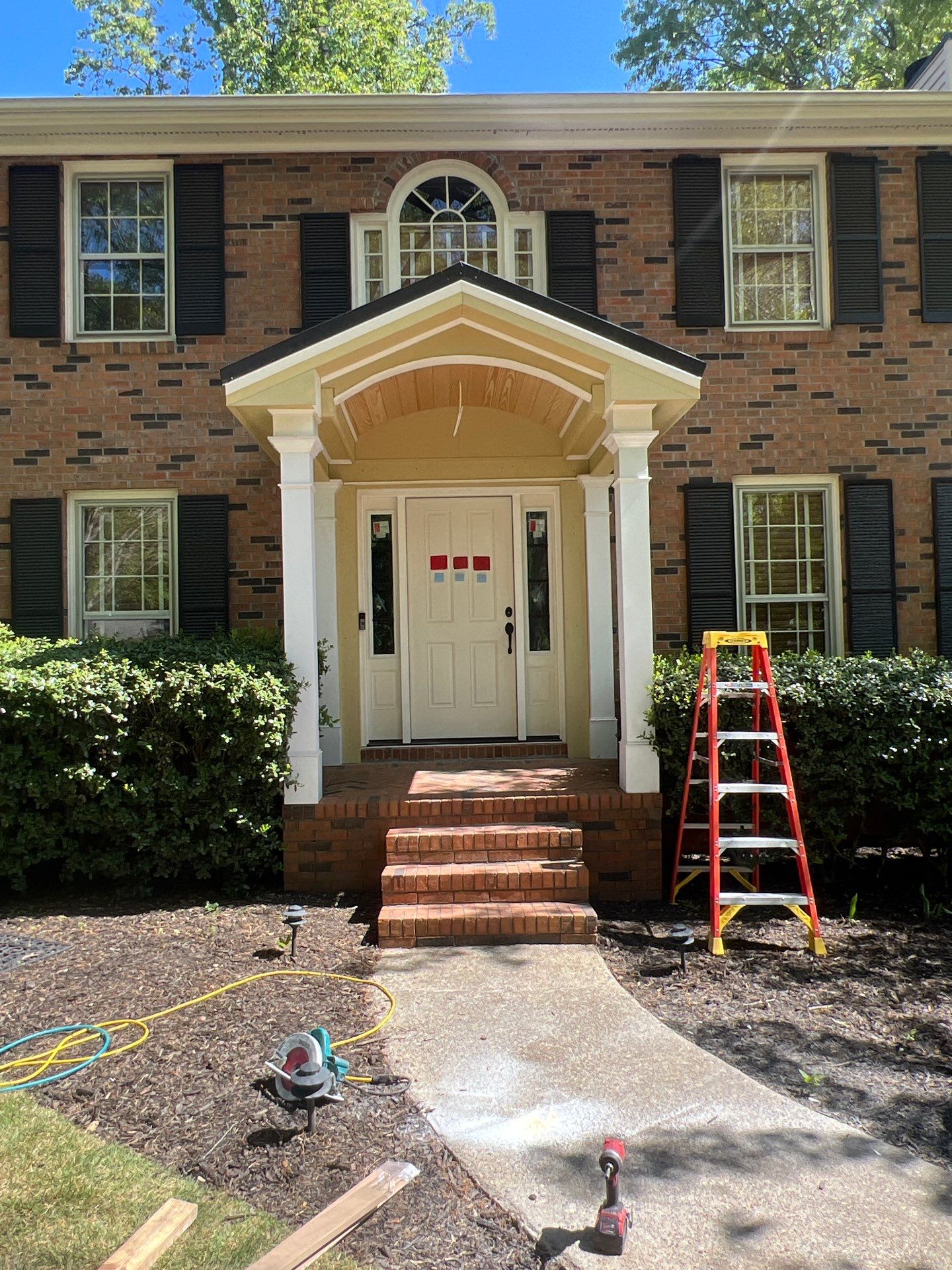 Exterior Entryway and Trim Renovation for Smyrna Brick Colonial by Swift Home Renovations