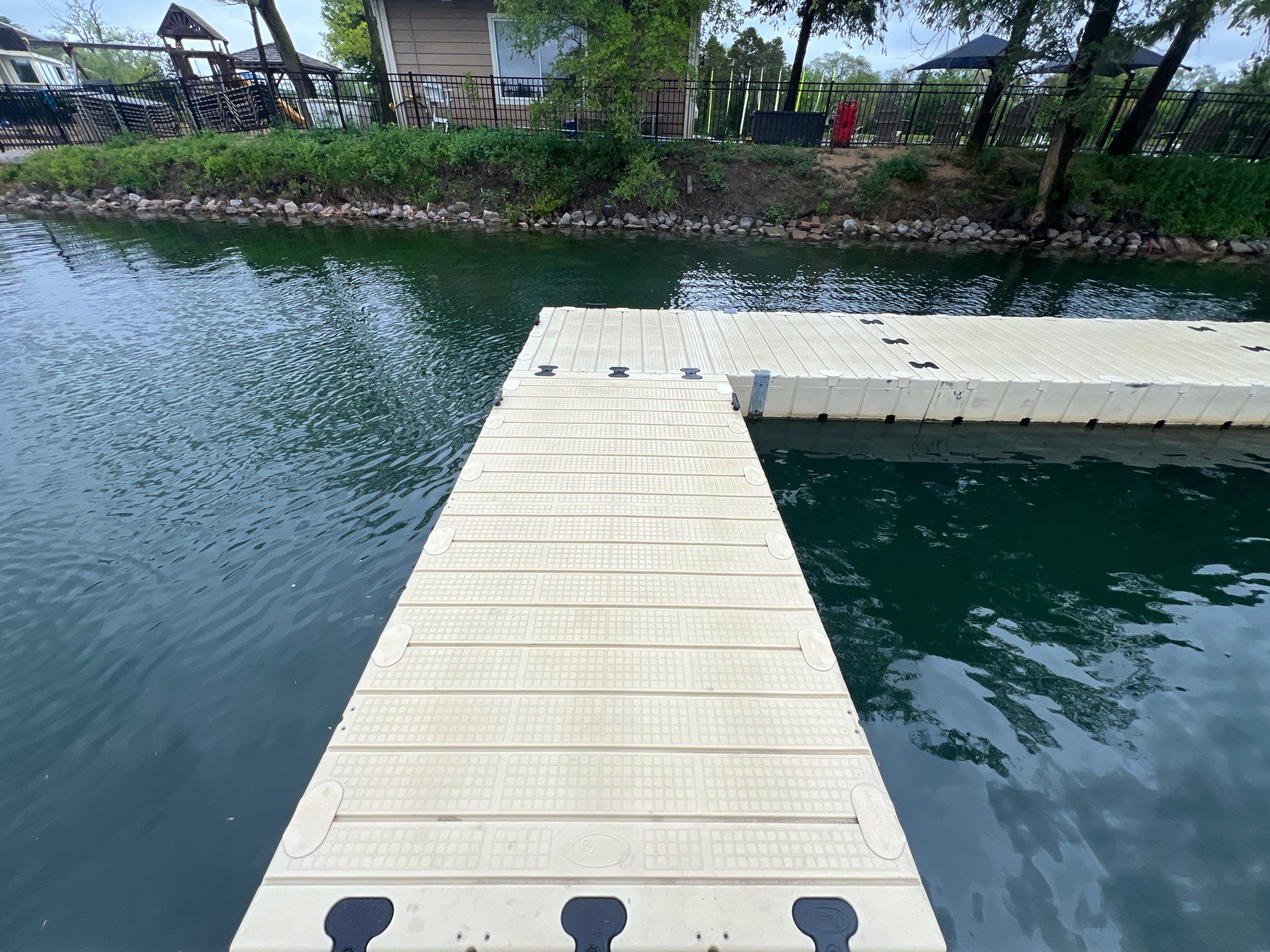 Power washing of floating dock by Northern Power Washing LLC.