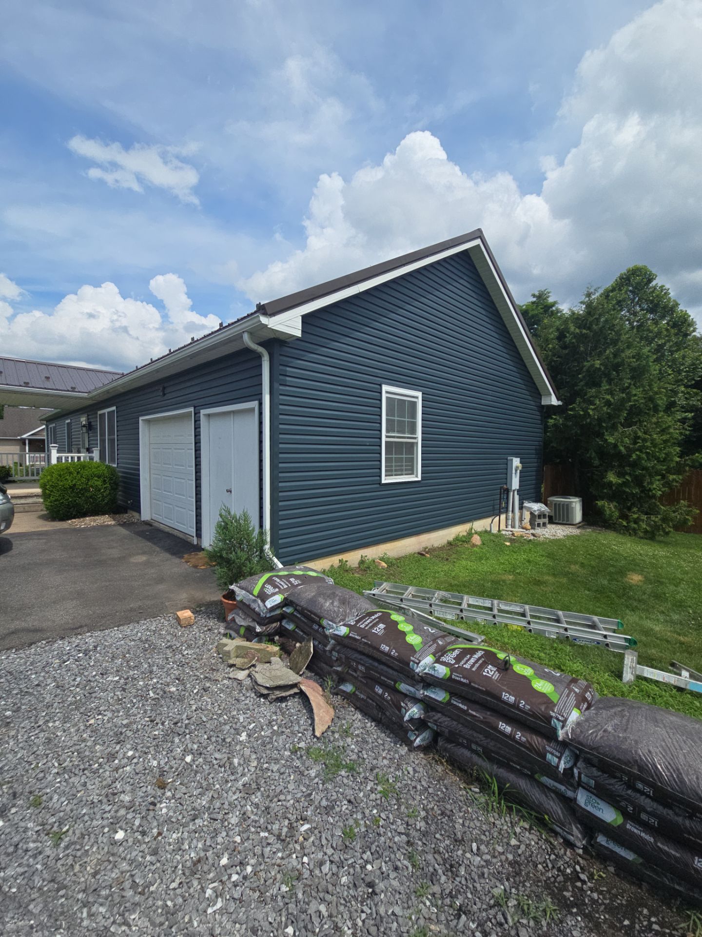 Elyse Goodman Siding and metal Installation  by Good Hands Roofing