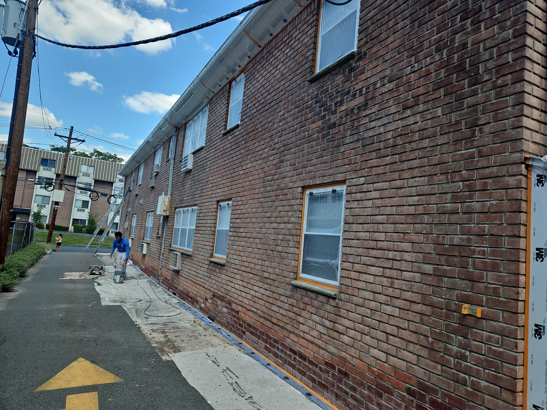 Multi-Unit Apartment Complex Exterior Brick Painting Project in Hackensack by Spectrum Painting, LLC