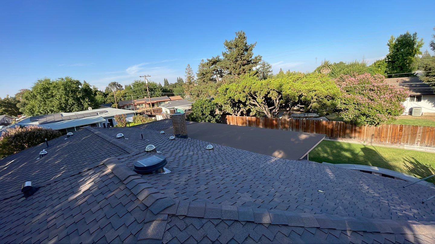Installation of Certainteed Presidential shingles on residential house by Straight Edge Roofing Inc