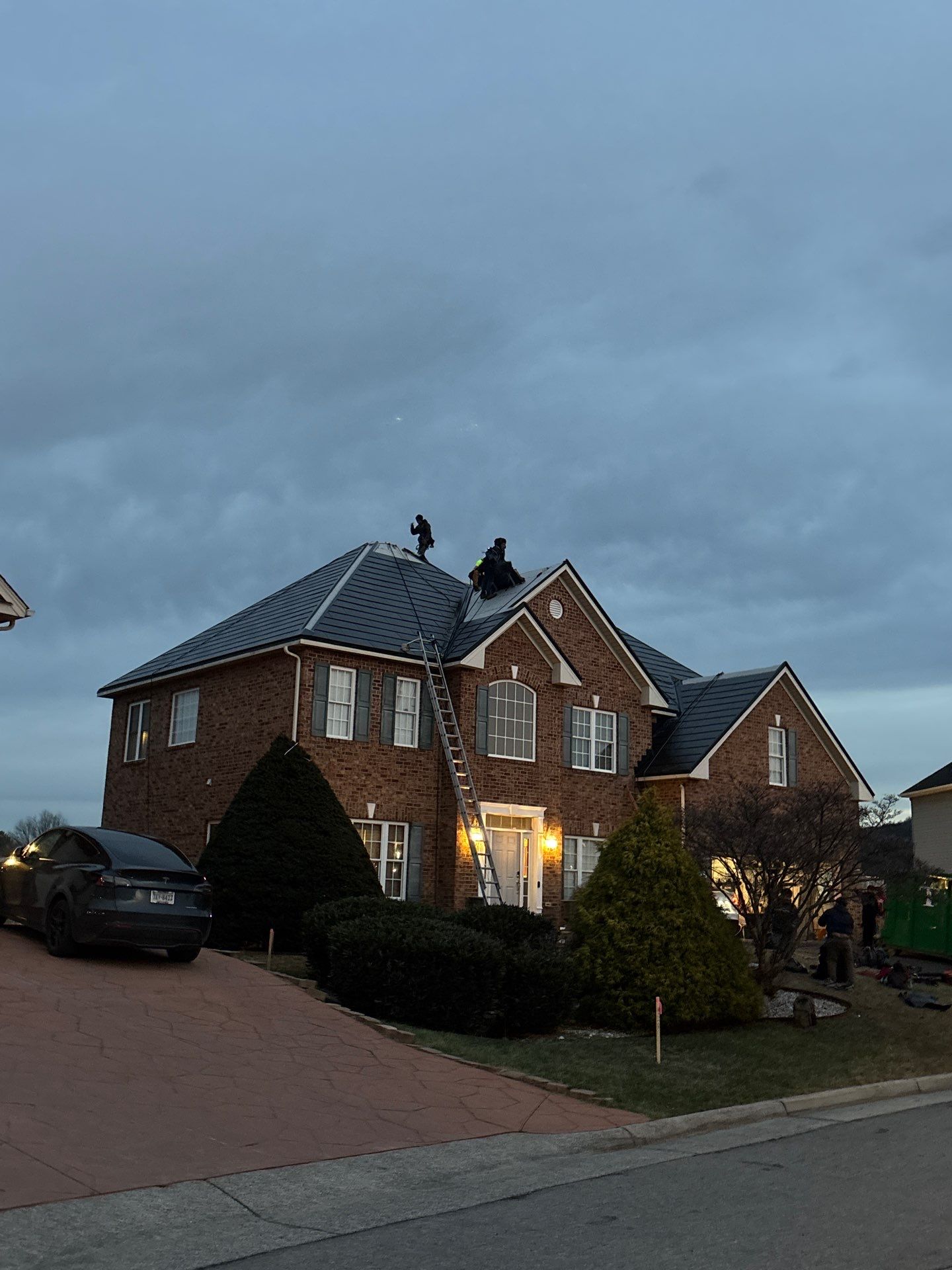 Winter Tesla Solar Roof Installation! by American Home Contractors