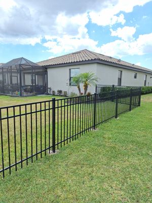 Aluminum Fence Installation using Black 3 Rail Aluminum Fence