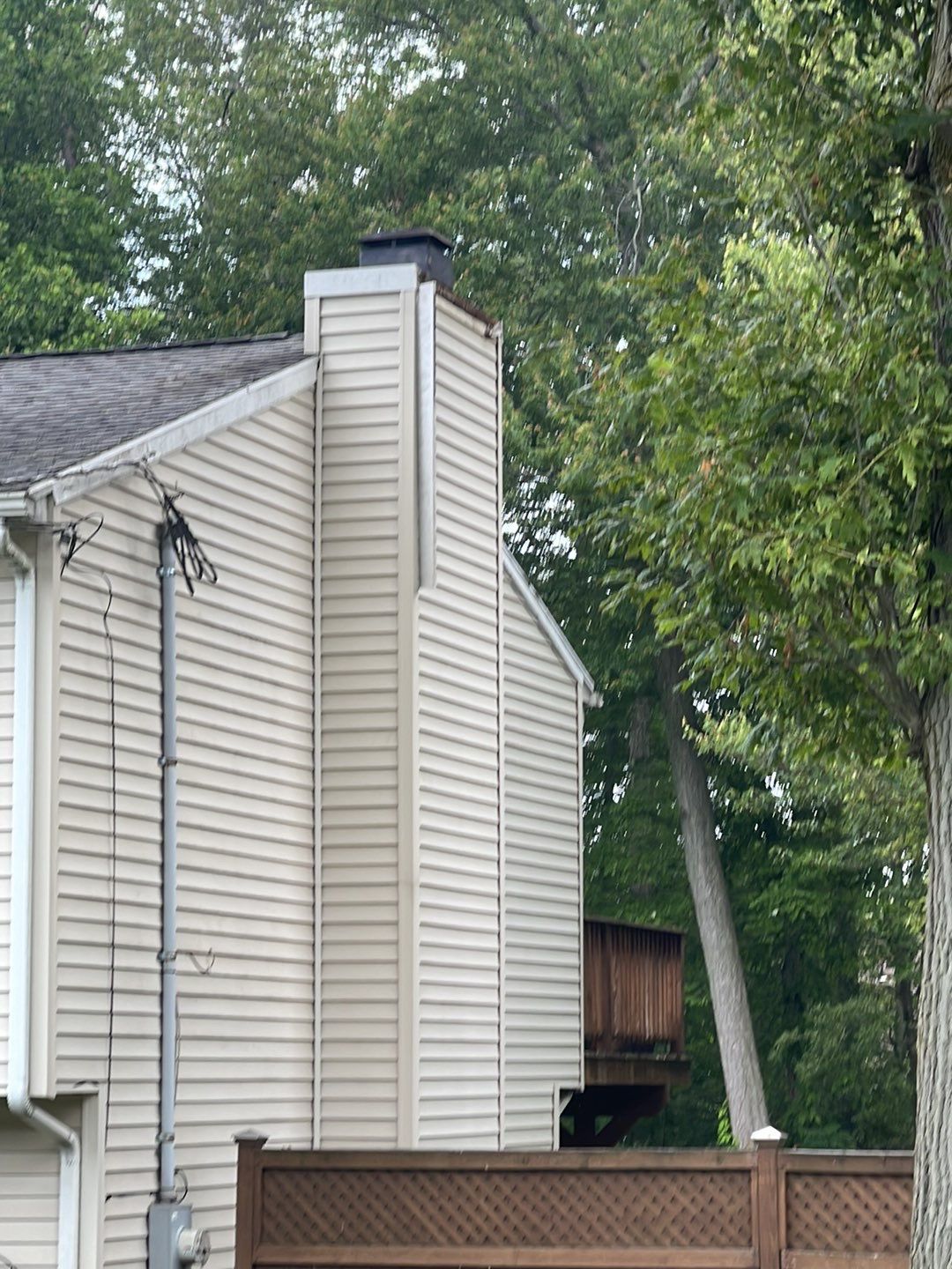 Gutter Cleaning Chimney top repair by A Plus Exterior