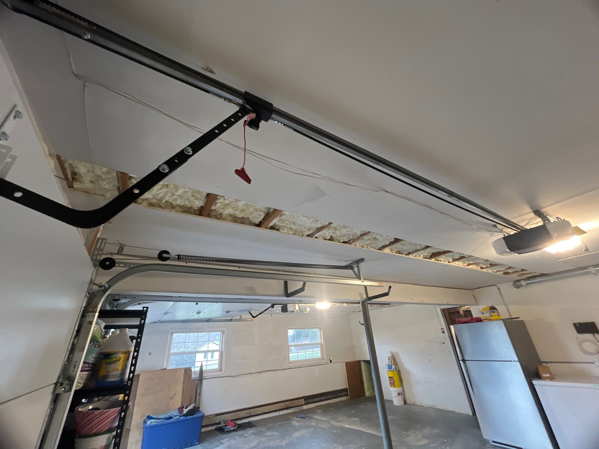 Garage ceiling using open cell spray foam by NYS Foam & Energy