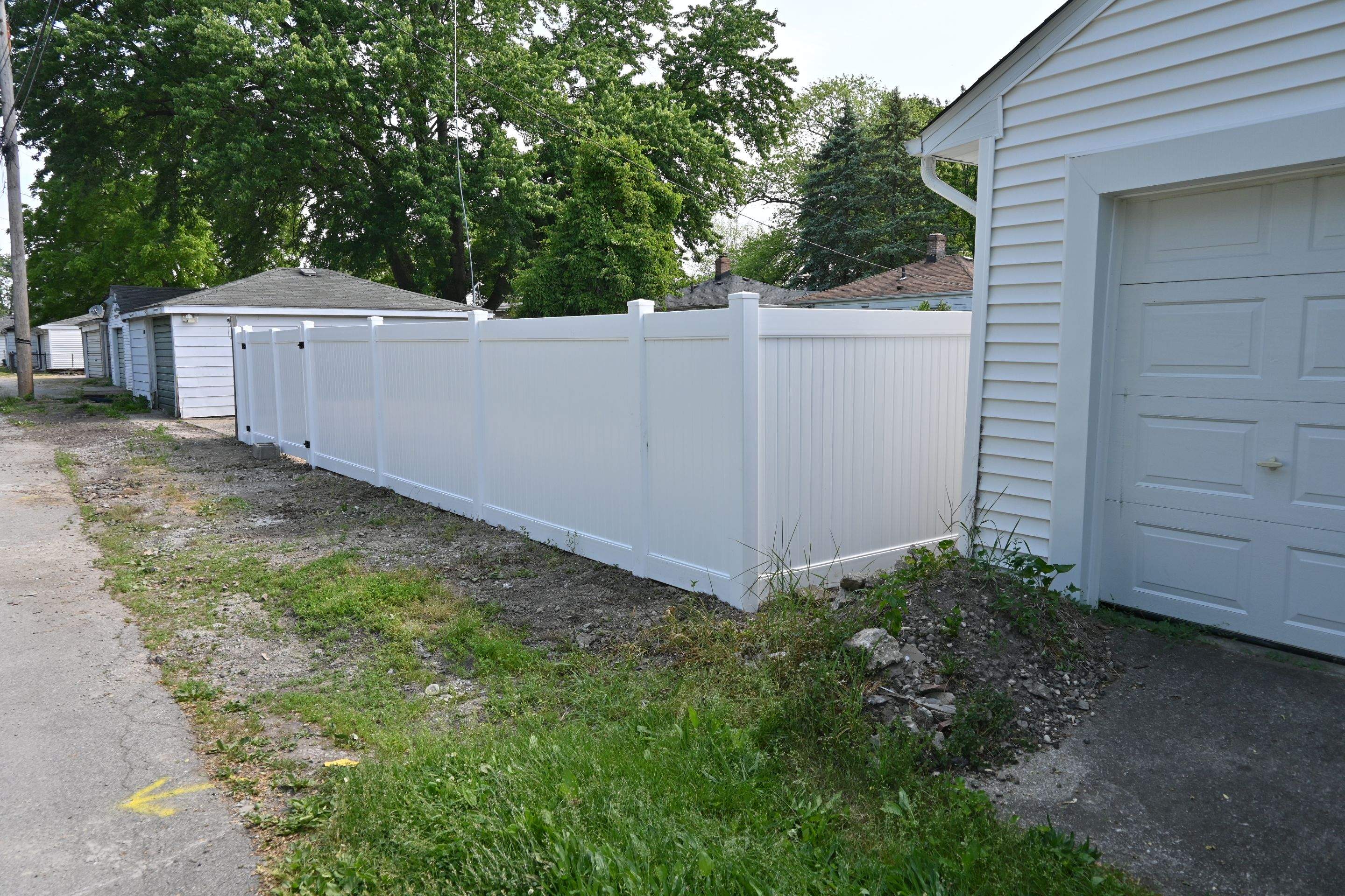 Wood to Vinyl Fence Replacement by Kraz Construction