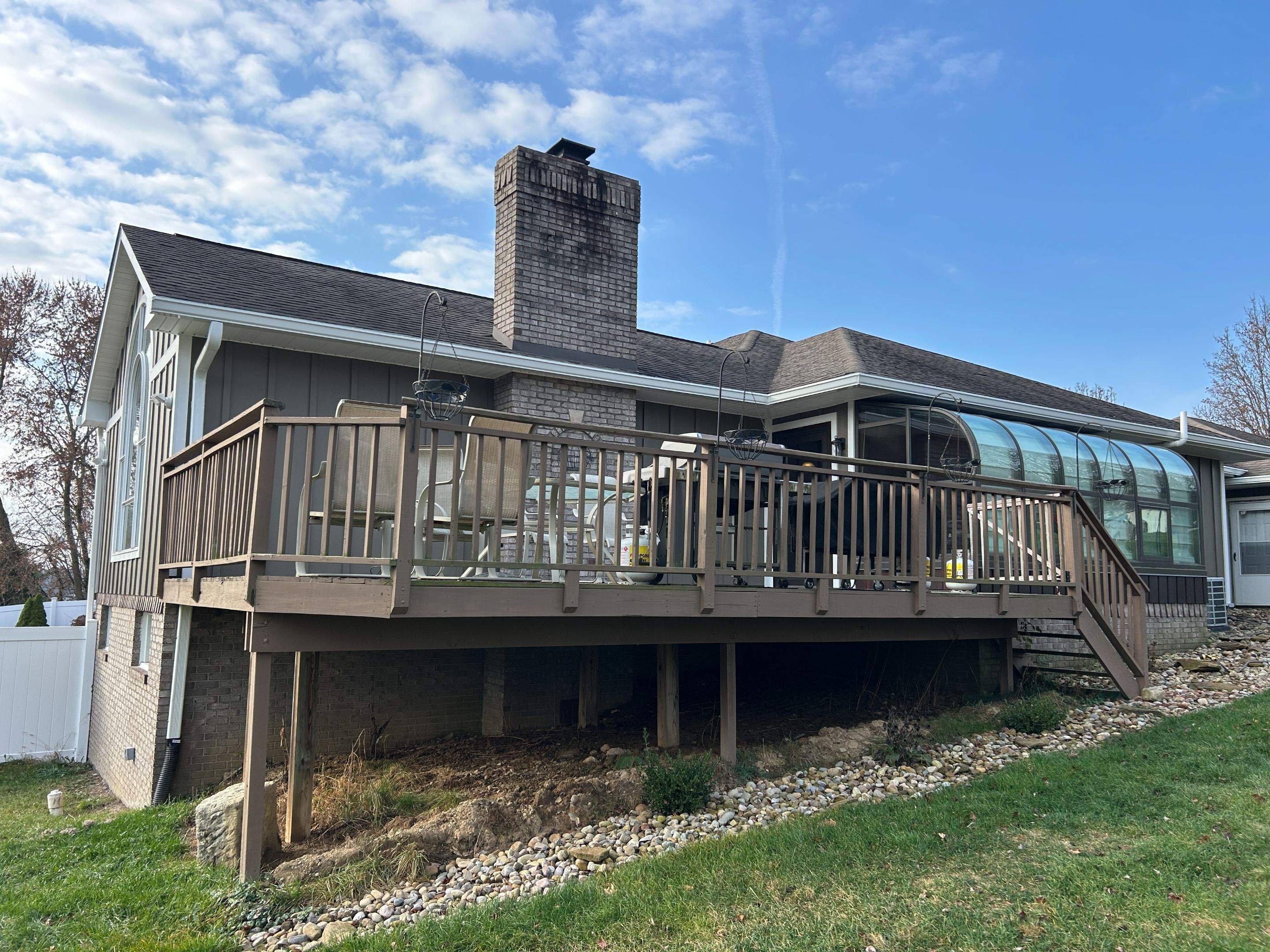 Steubenville Exterior Renovation Featuring Vertical Siding and Stone Accents by Ideal Siding Pittsburgh