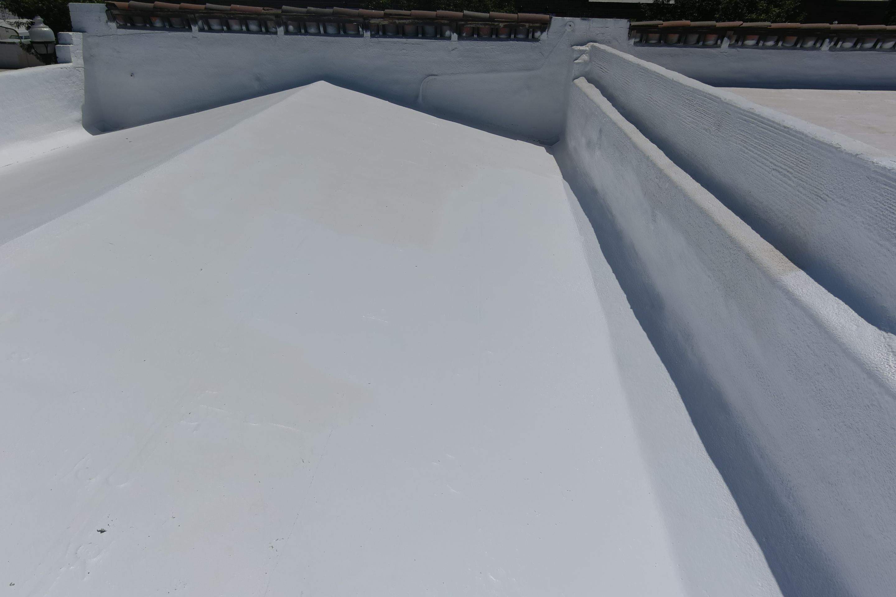 Commercial Roofing Installation using Conklin BenchPly system with PUMA top coat (imbedded fabric system) by Straight Edge Roofing Inc