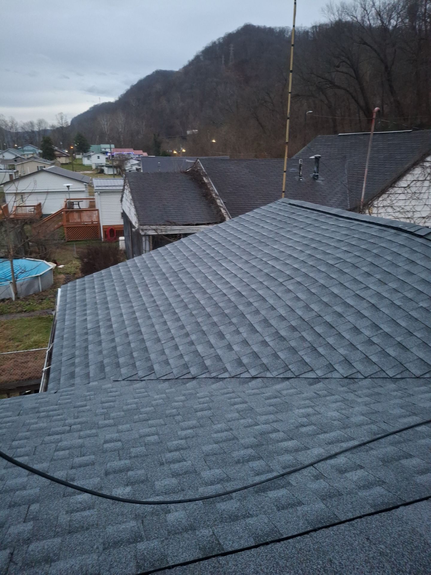 Residential Roofing Installation using GAF Timberline HDZ Oyster Grey by Rainstoppers Roofing