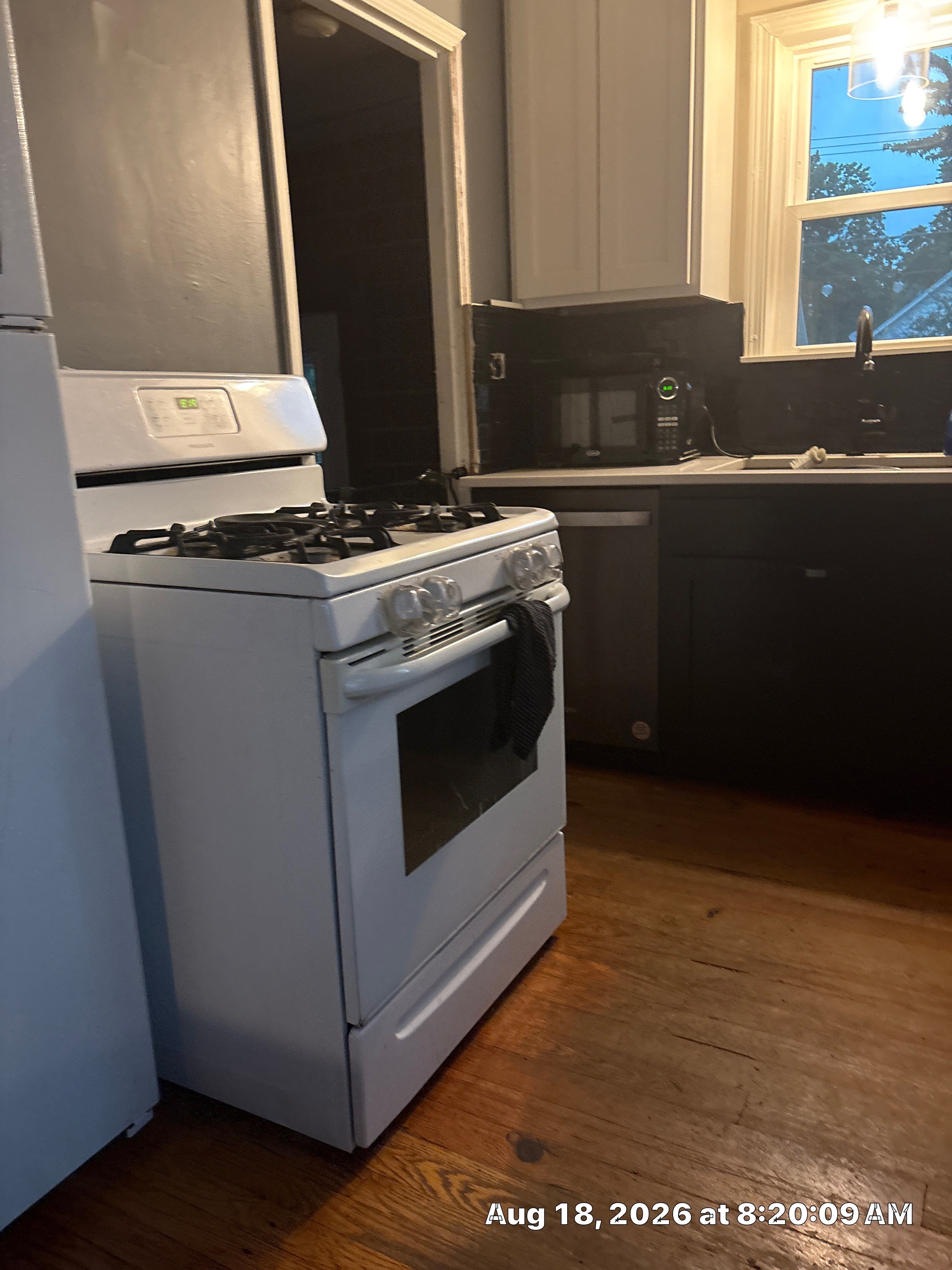 Lincoln Kitchen Renovation Featuring Black and White Shaker Cabinetry by CompanyCam Sales Demo
