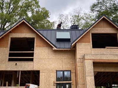 New Roof Installation using 16" Standing Seam Panels