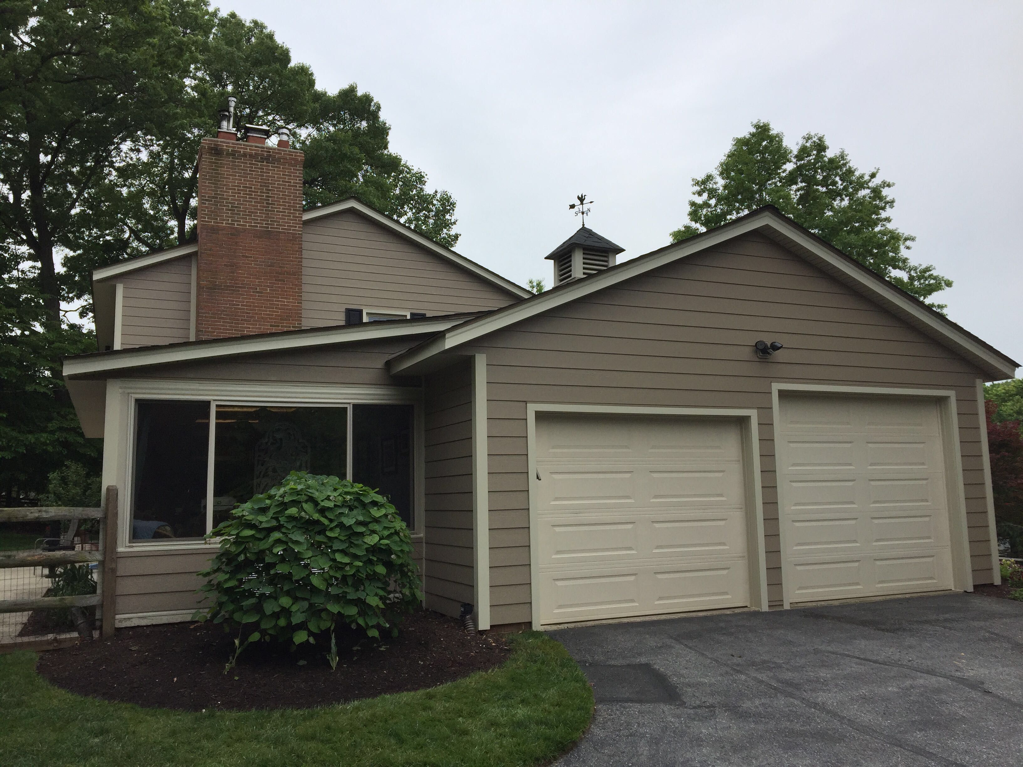 Siding and Roof Replacement by American Home Contractors
