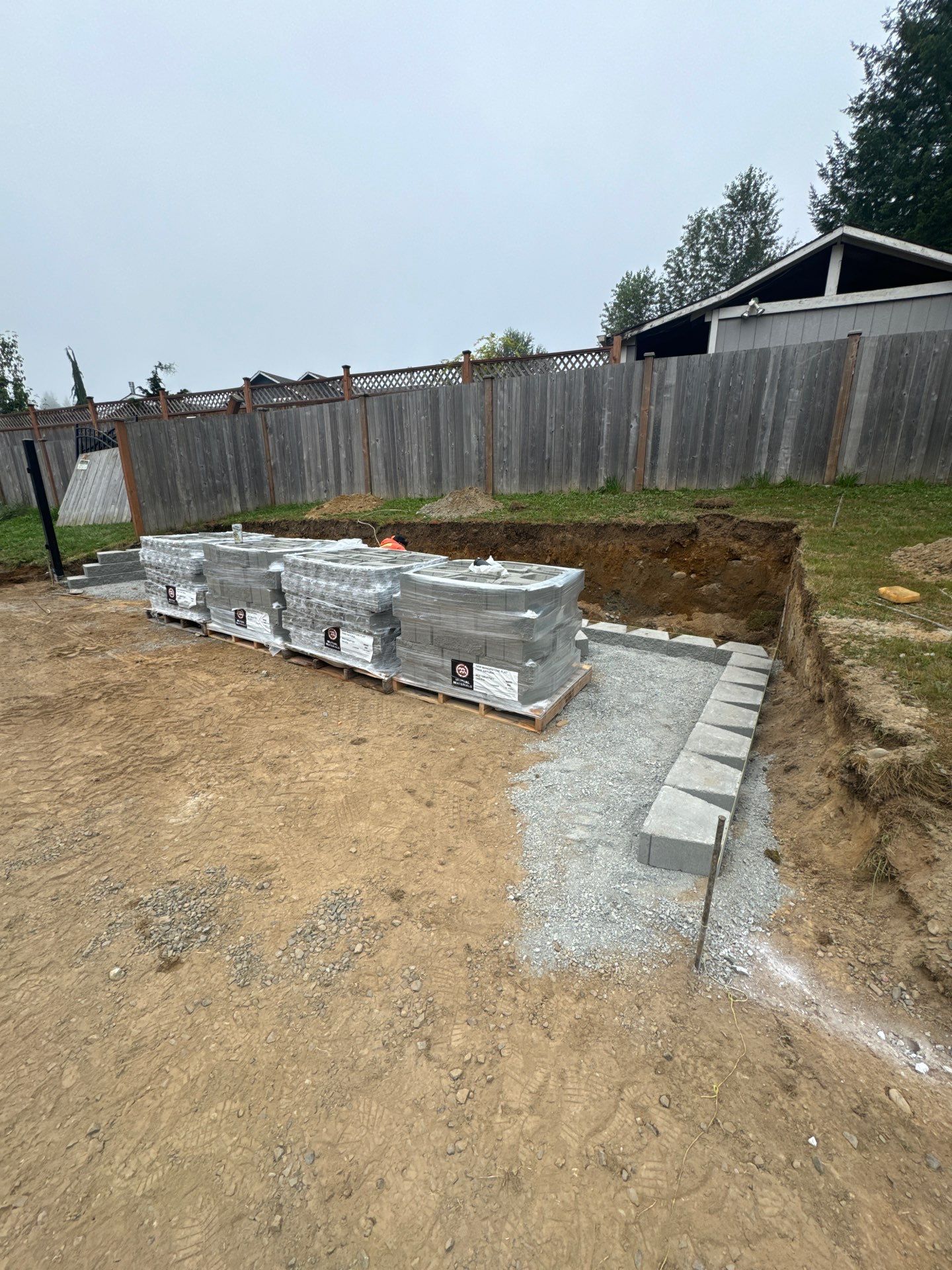 Joann | Asphalt Driveway & Retaining Wall  by Jireh Asphalt & Concrete Inc 