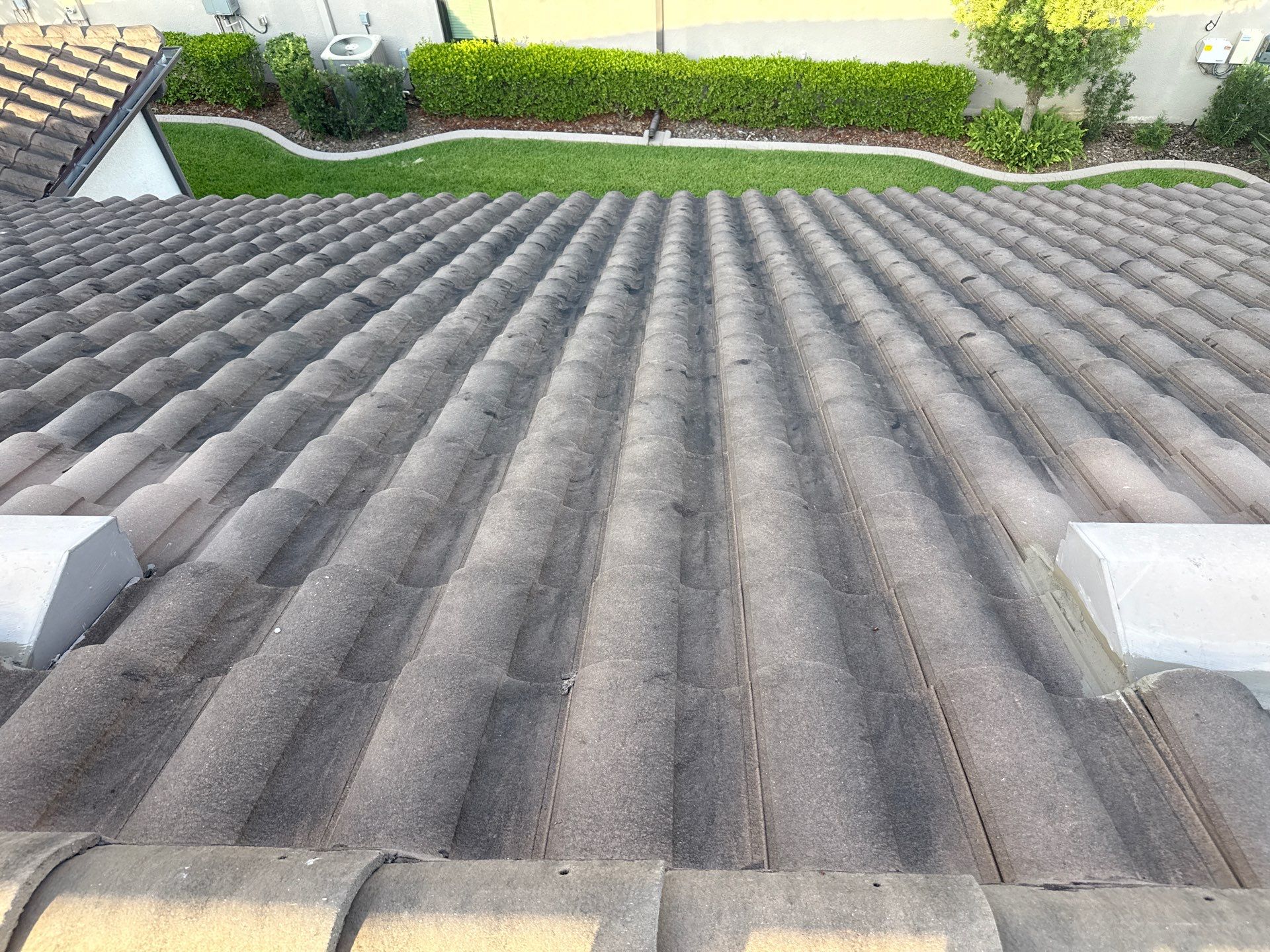 Soft Wash Roof Cleaning – Concrete Tile Roof | Artisan Lakes Esplanade, Palmetto, FL by Sunshine AquaWash