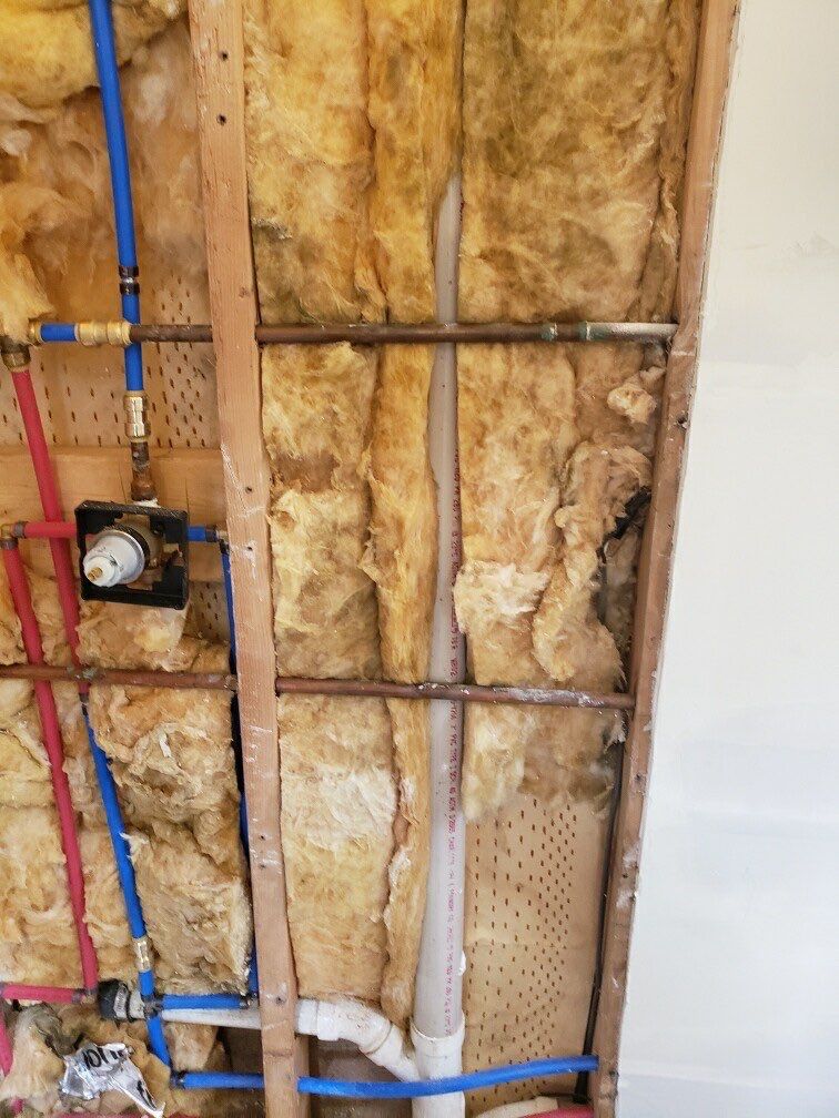 Bathroom Remodel using BCI Acrylic Shower System by Secure Construction Company Inc