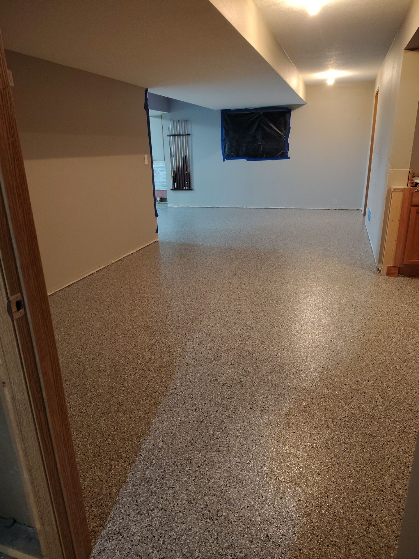 Maxwell, IA Coyote Flake Garage and Basement by Revival Concrete Coatings