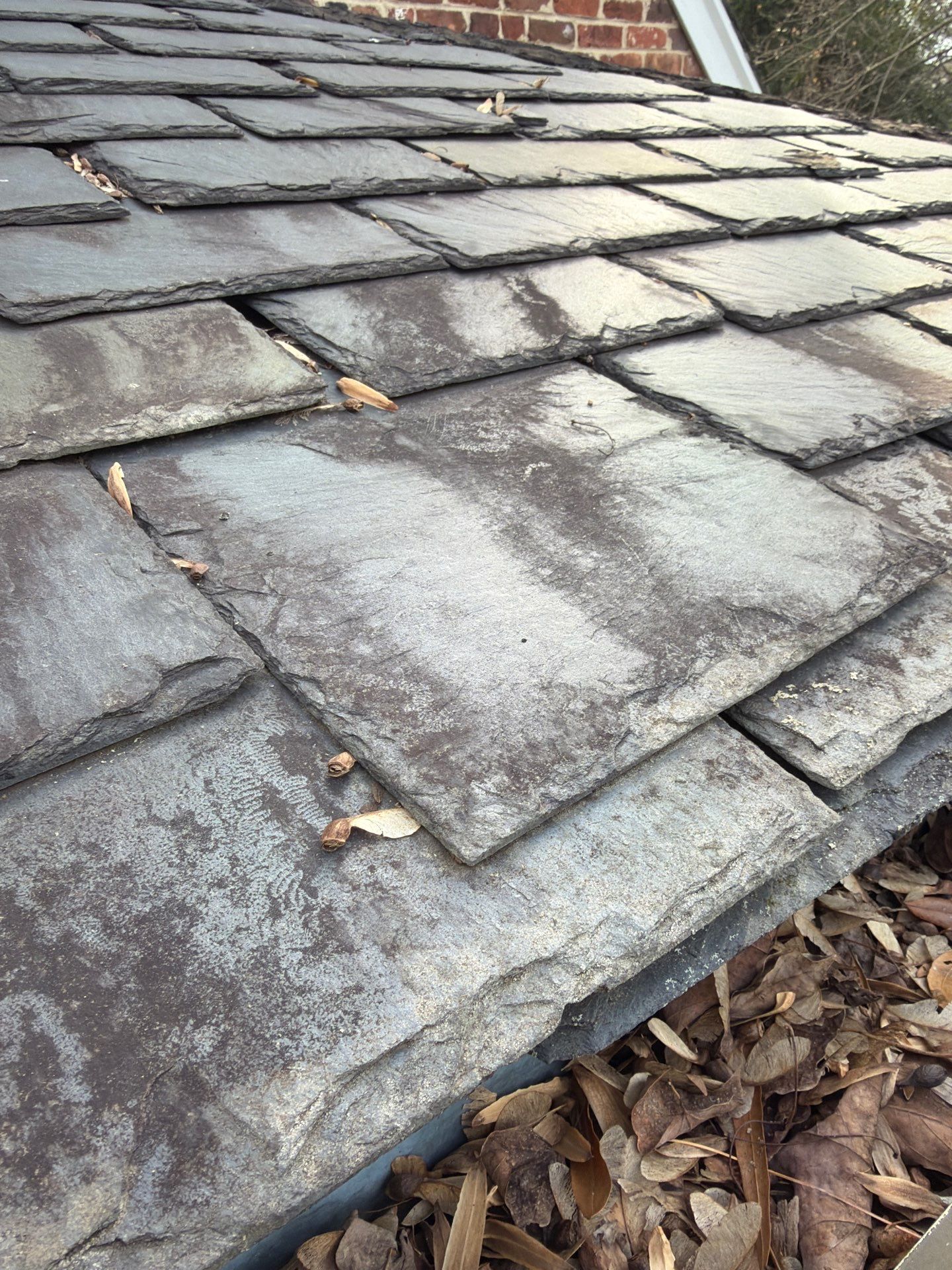 Slate Roof Restoration and Copper Ridge Cap Install in Richmond by Cade Construction