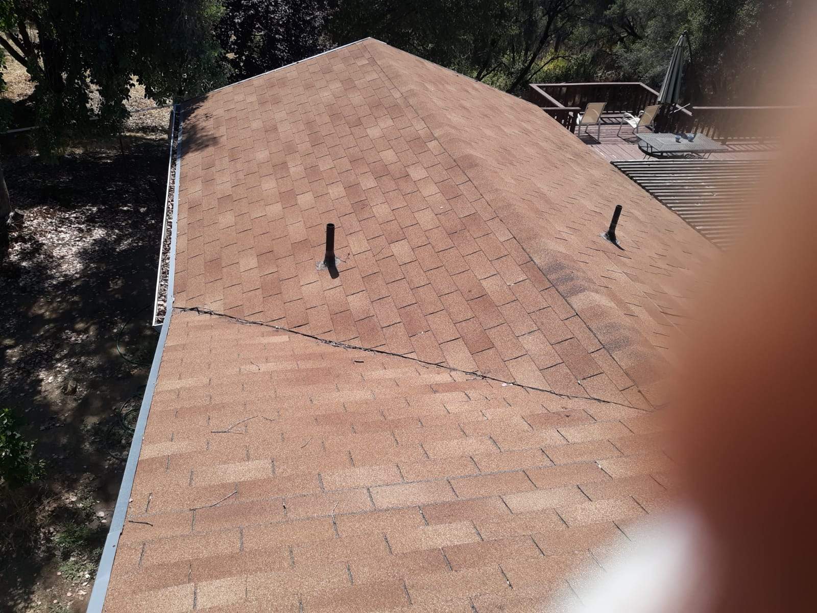 Metal roofing installation using Standing seam metal roofing system by Straight Edge Roofing Inc