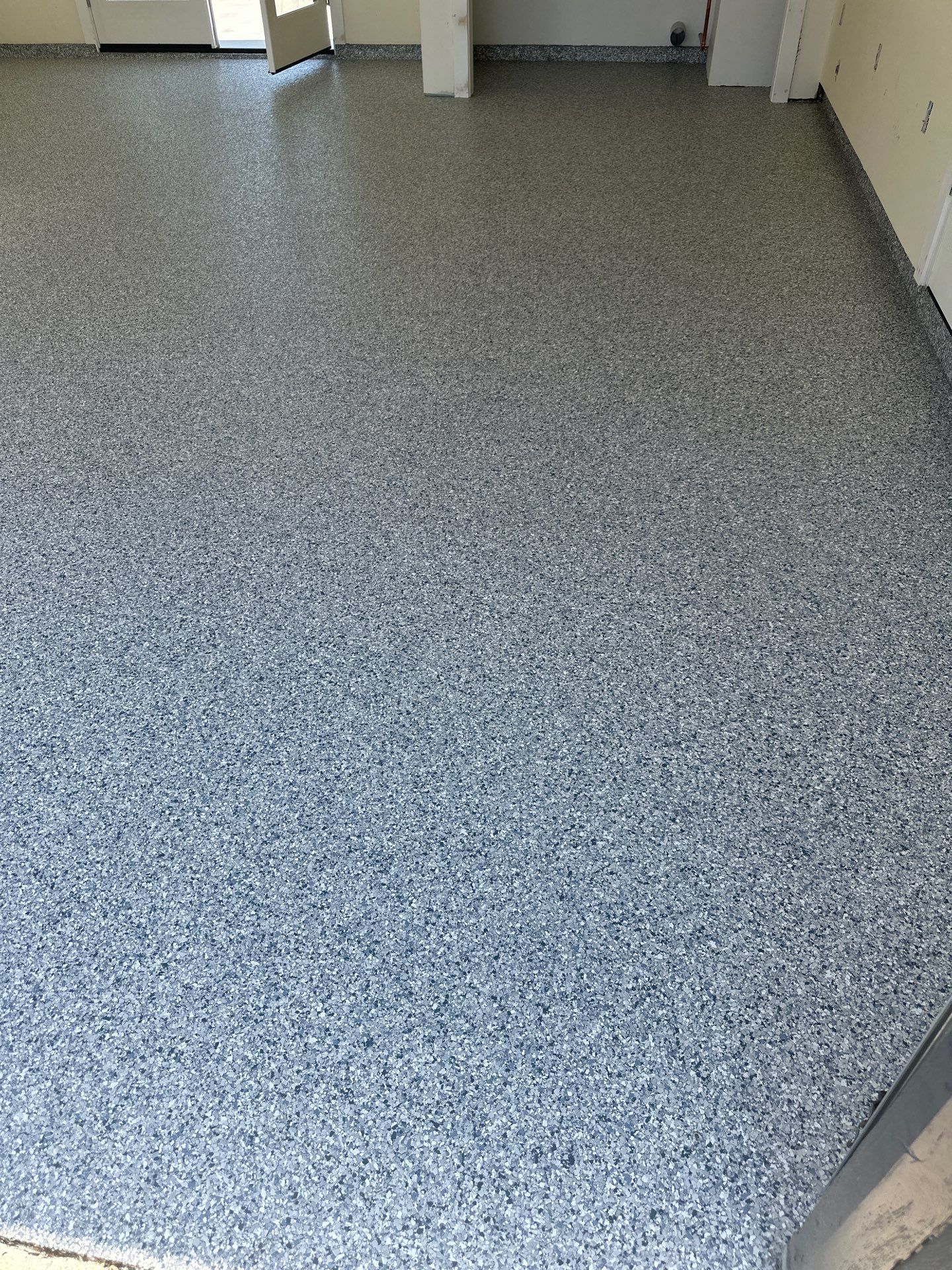 Polyurea Garage Floor Coating with Tidal Wave Flake Finish by MGP Coatings