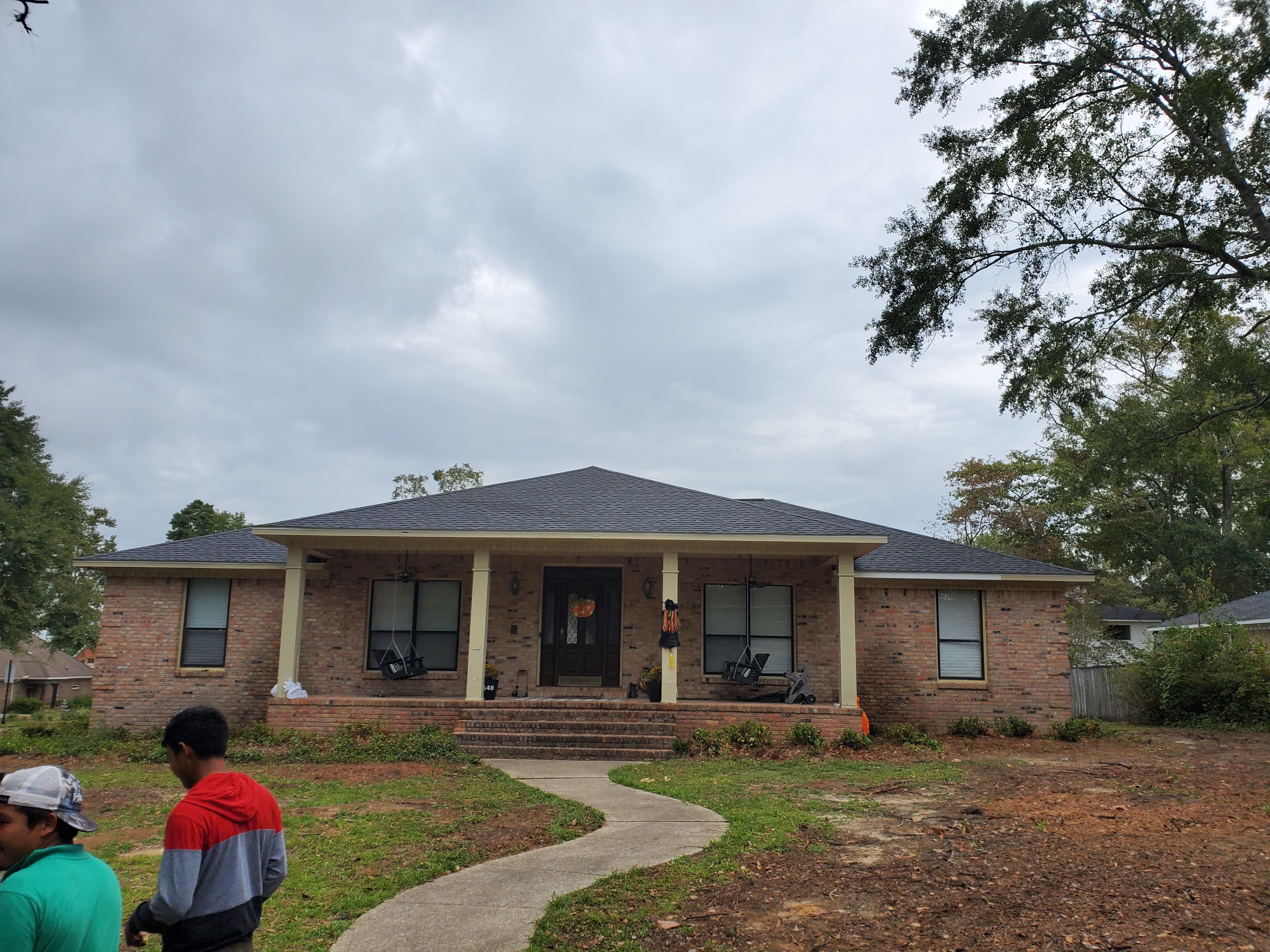Residential Roofing Installation using Roof Replacement by American Roofing & Construction LLC