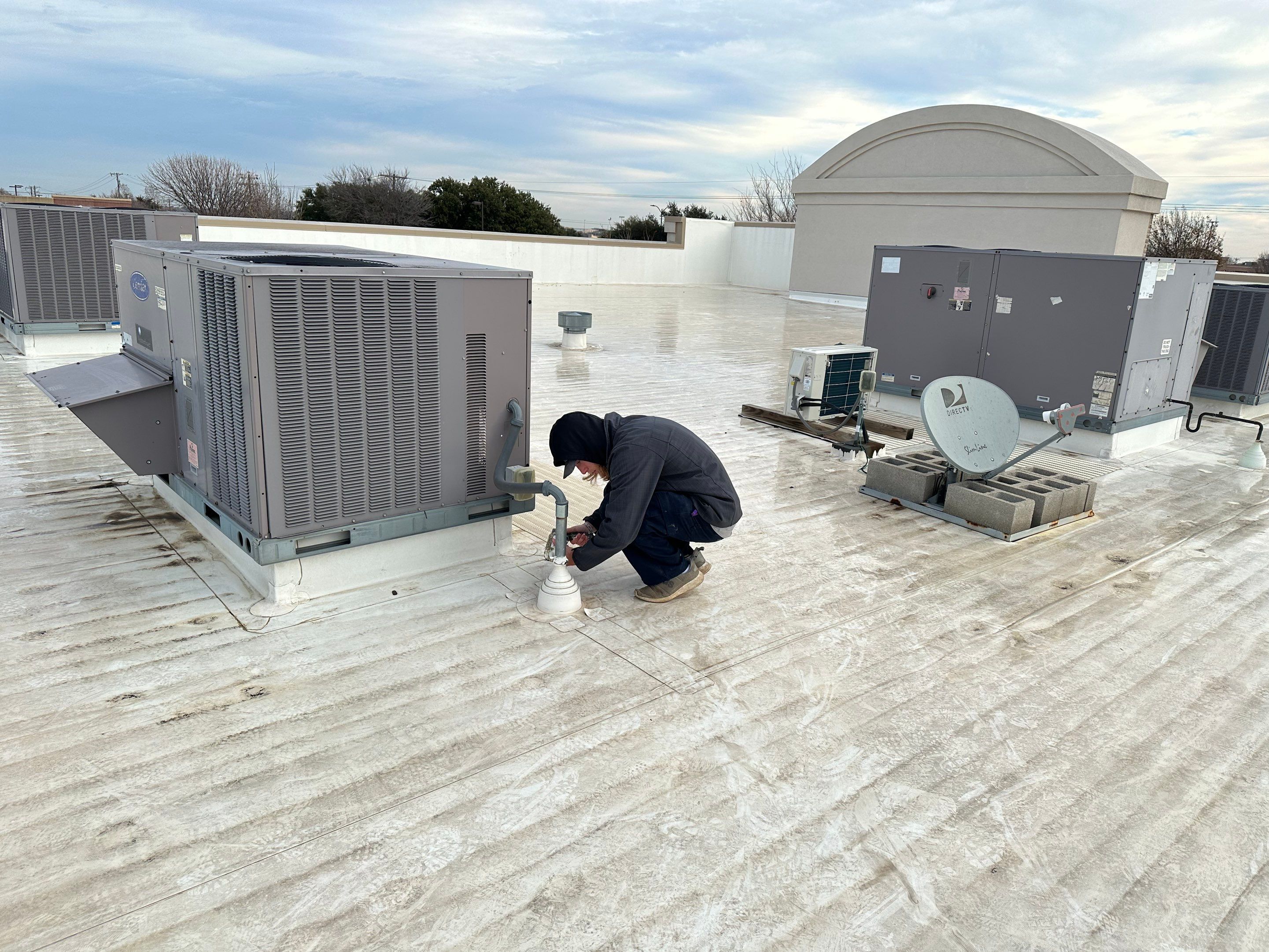 Commercial Roofing Repair using Re-Seal Pipe Flashing by OneSource Roofing and Restoration