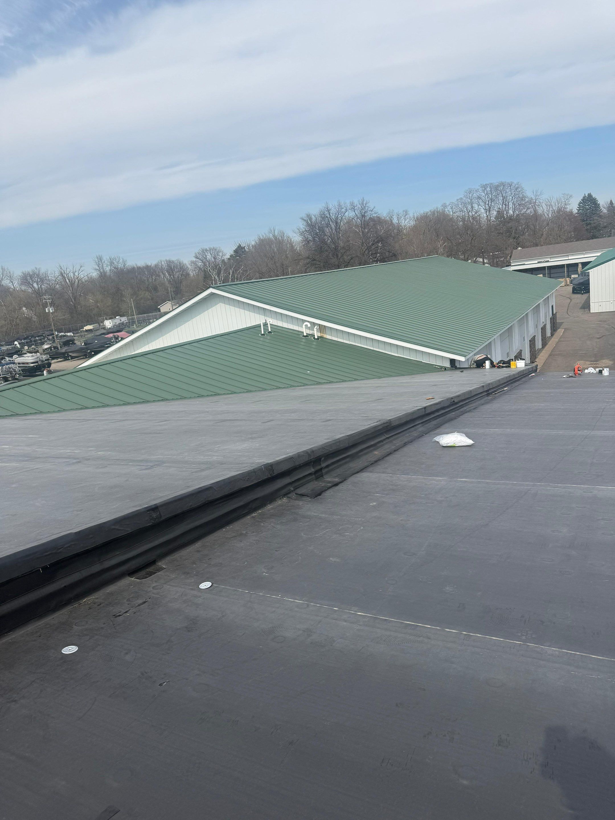 Flat Roof   by Gunner Insulation and General Contracting