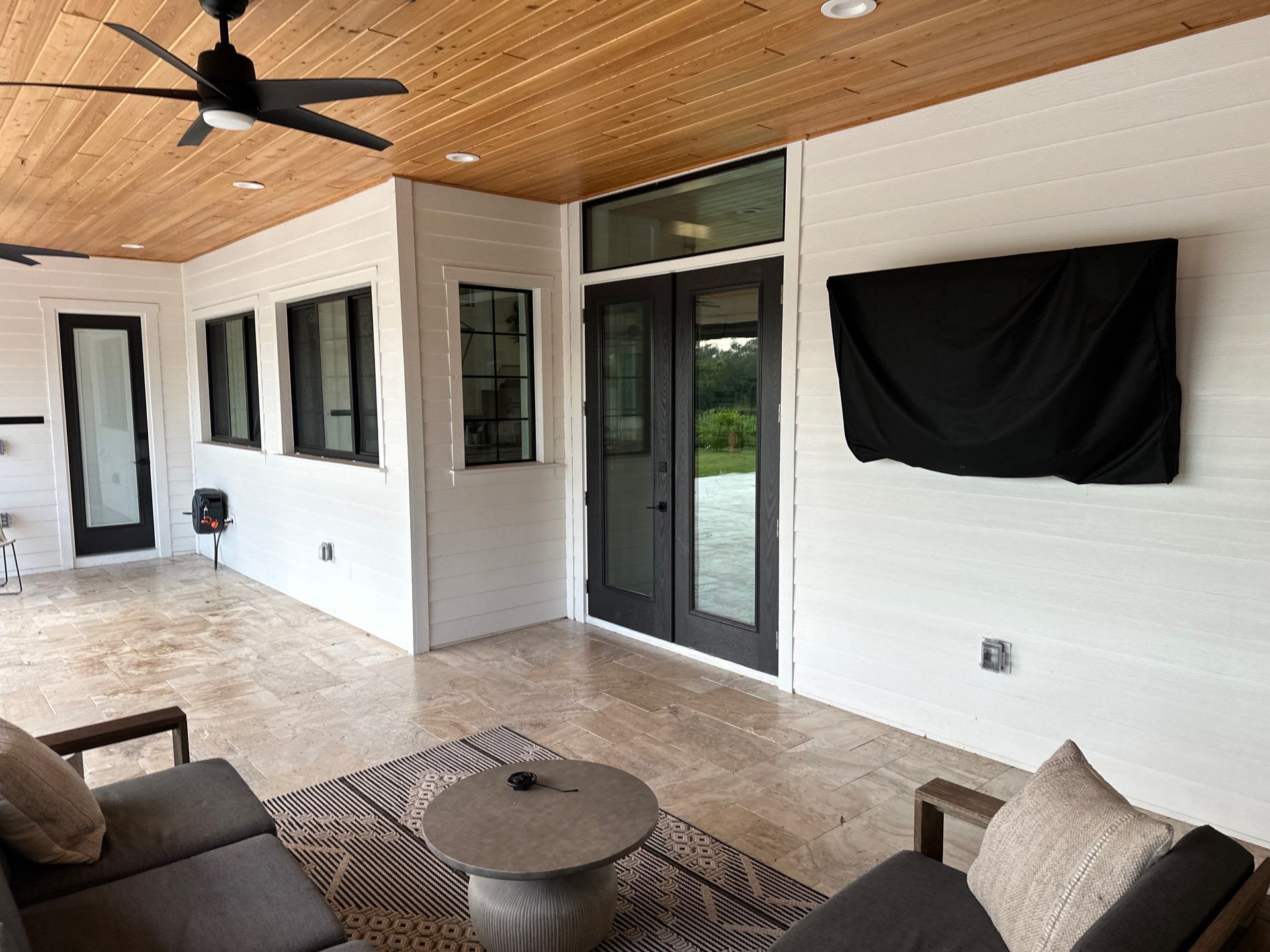 Complete Two-Story House Wash and Driveway Cleaning in Winding River Community, Bradenton, FL by Sunshine AquaWash