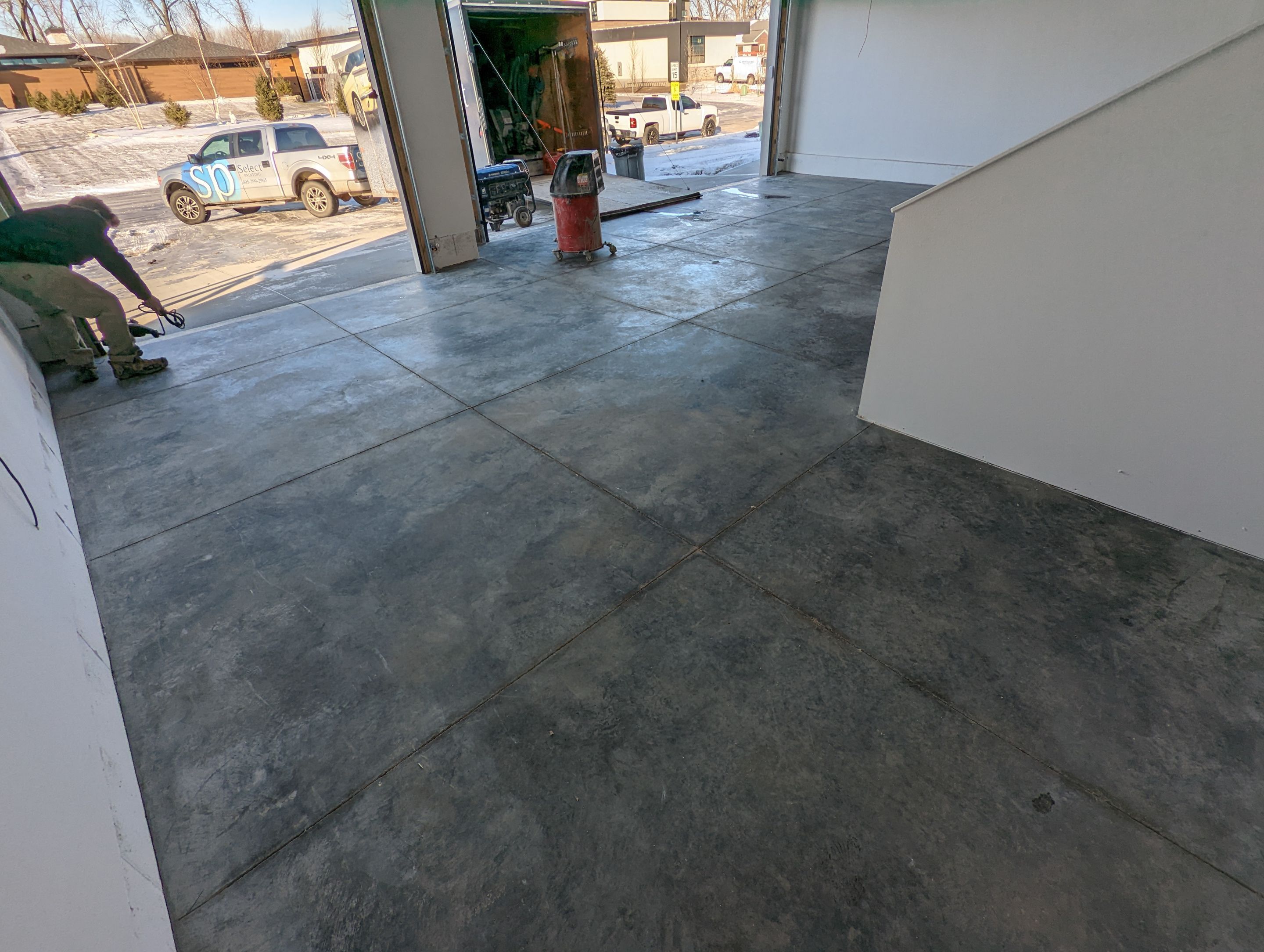 Garage using Sandstone by Select Painting, Coatings & Garage Cabinets