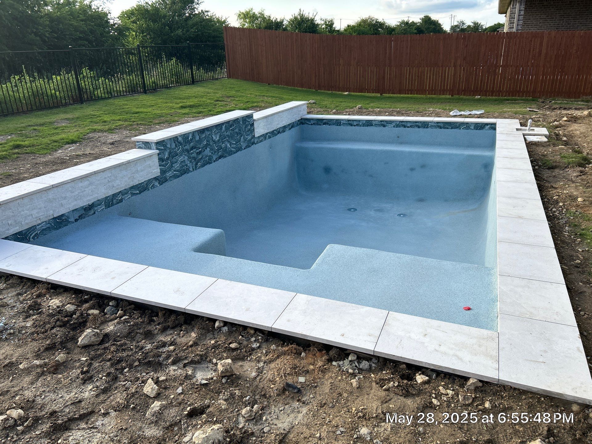 Sleek Geometric Pool with Crisp White Decking by Pinnacle Pools and Spas - DFW