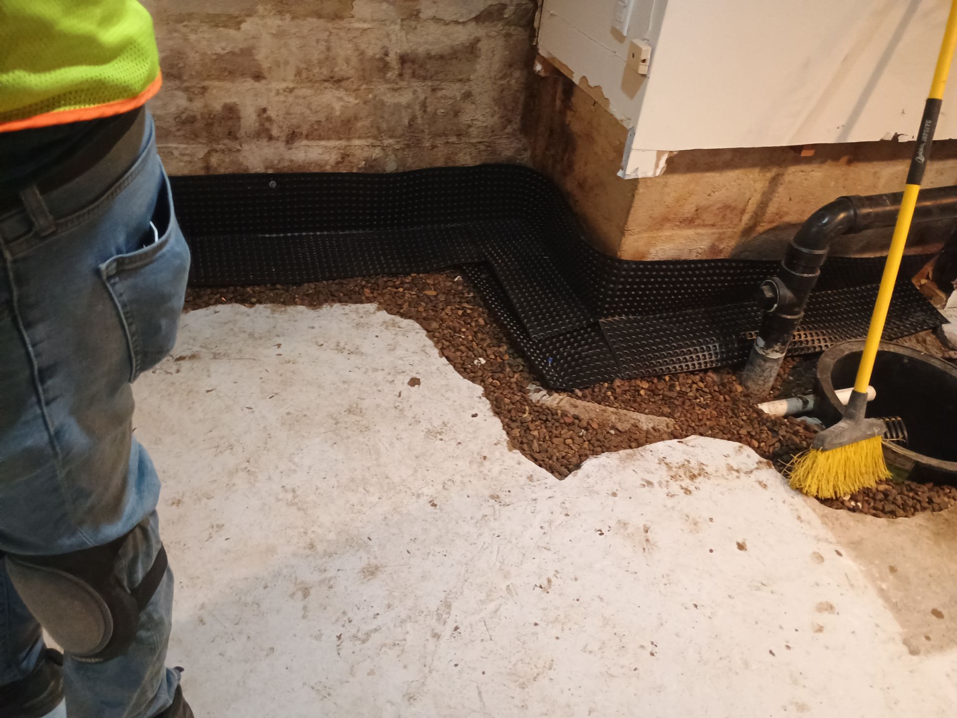 Interior Drain Tile & Sump Pump Installation in St. Paul, MN by Waterproofing Northeast