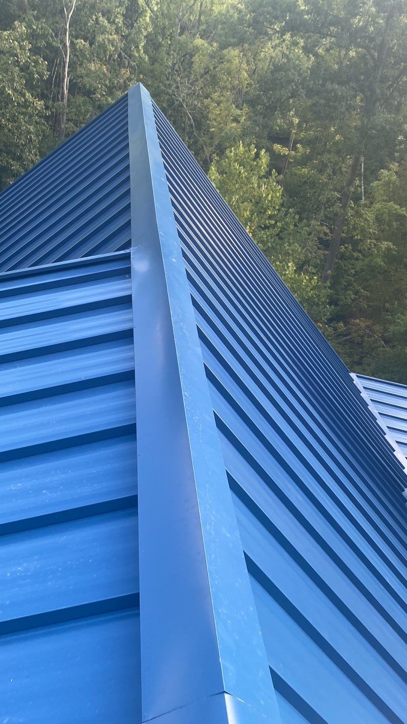 Residential Roofing Installation using Standing Seam Metal - Gallery Blue by RoofX 