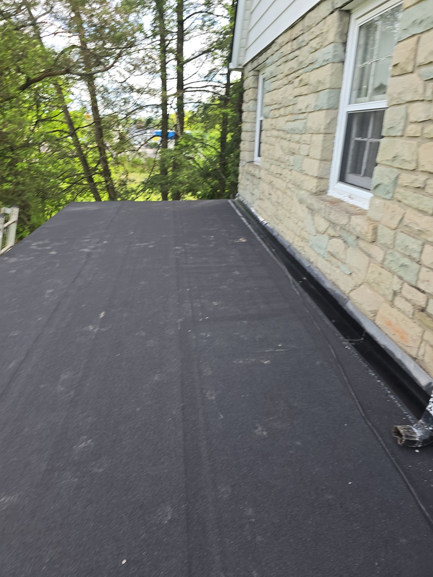 Residential Roofing Installation using GAF Timberline HDZ Charcoal by Rainstoppers Roofing