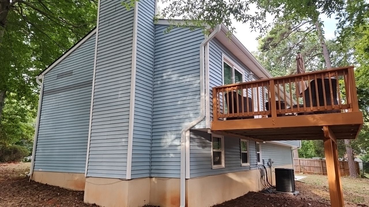 Gutter Cleaning using water by Power Wash Masters LLC
