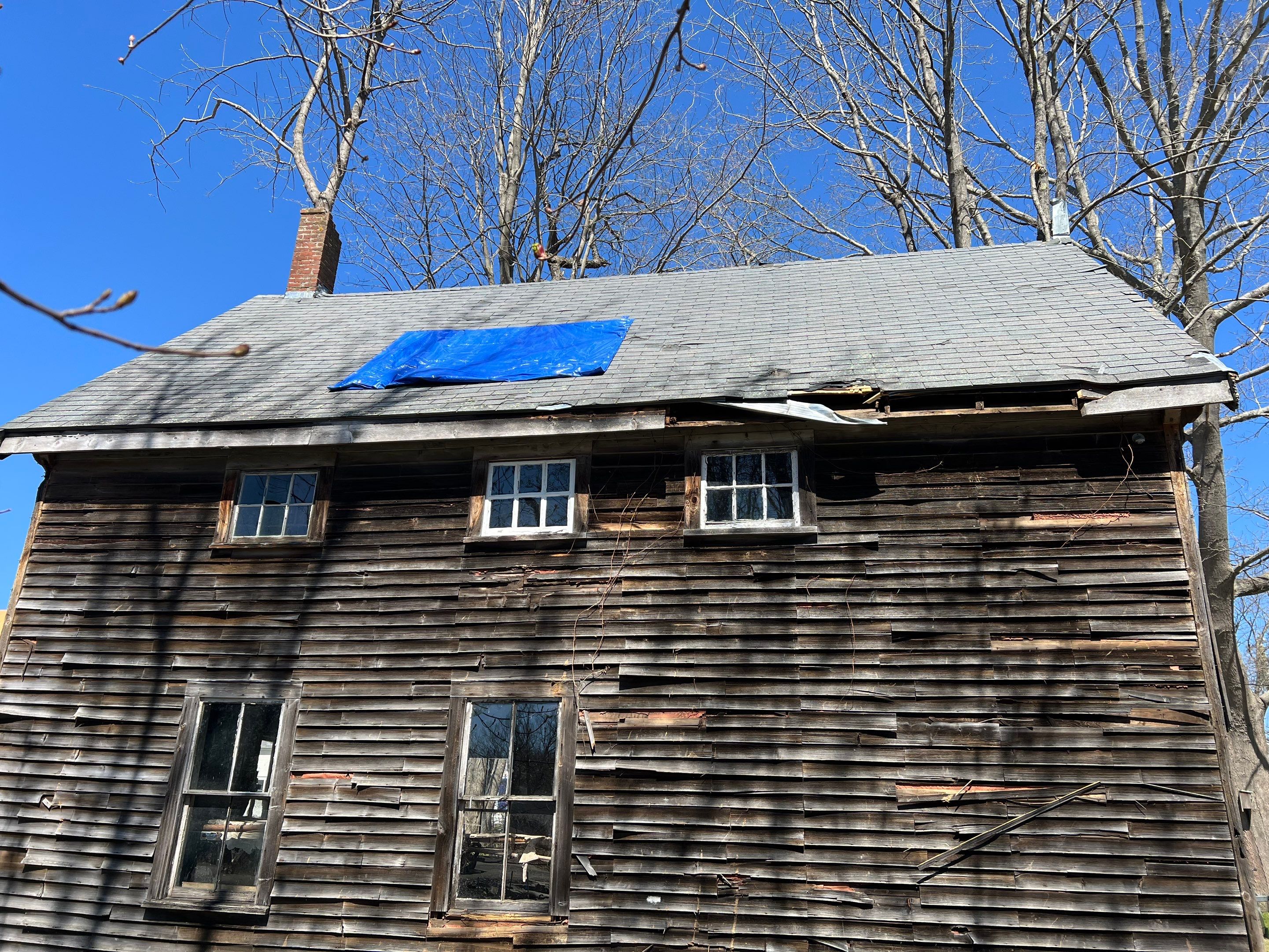 Just the beginning of a barn restoration in New Castle by Tall pine roofing